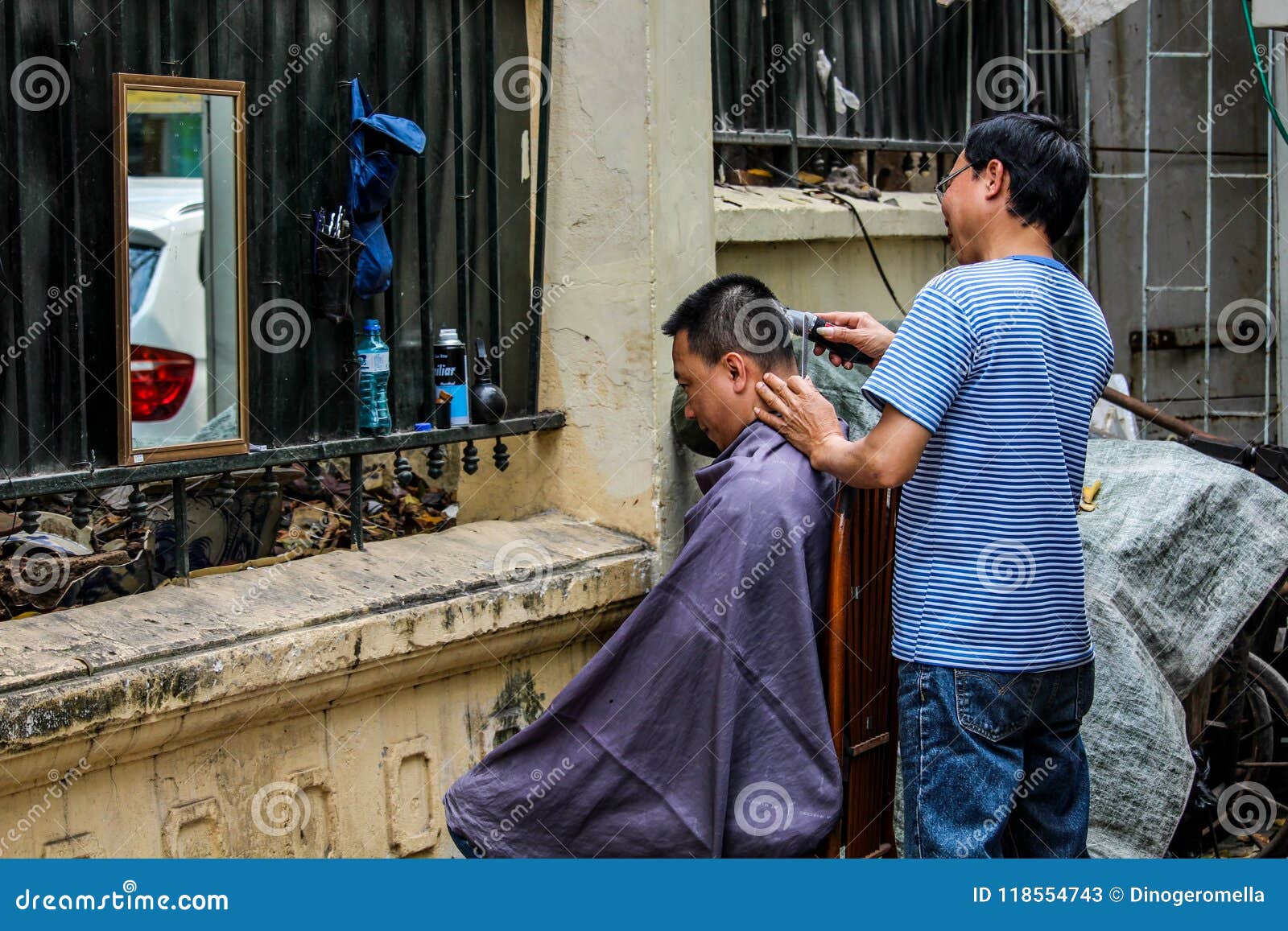 Street haircut Hanoi editorial stock photo. Image of poor - 118554743