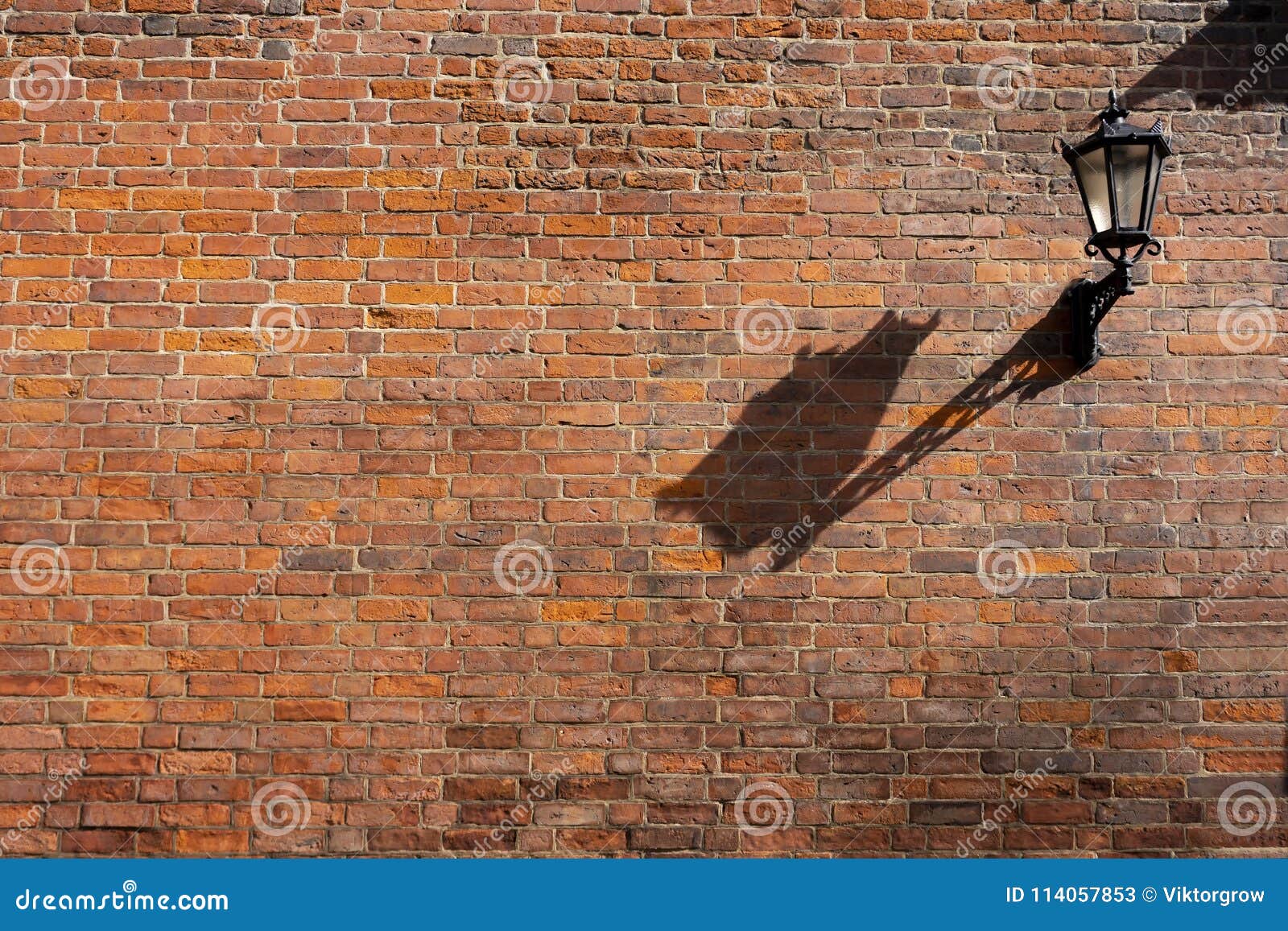 Street Lamp on a Brick Wall Stock Image - Image of cement, mortar ...