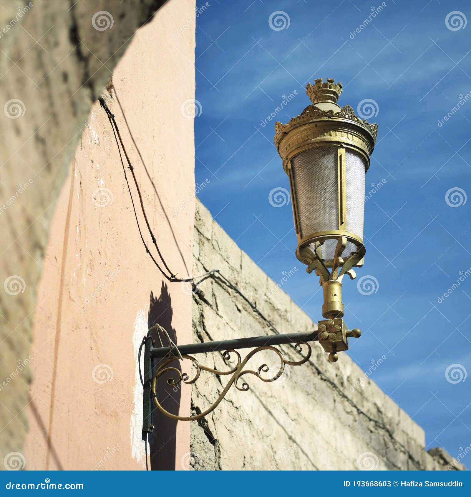 Street Light Hanging on the Wall. Conceptual Image Shot Stock Image