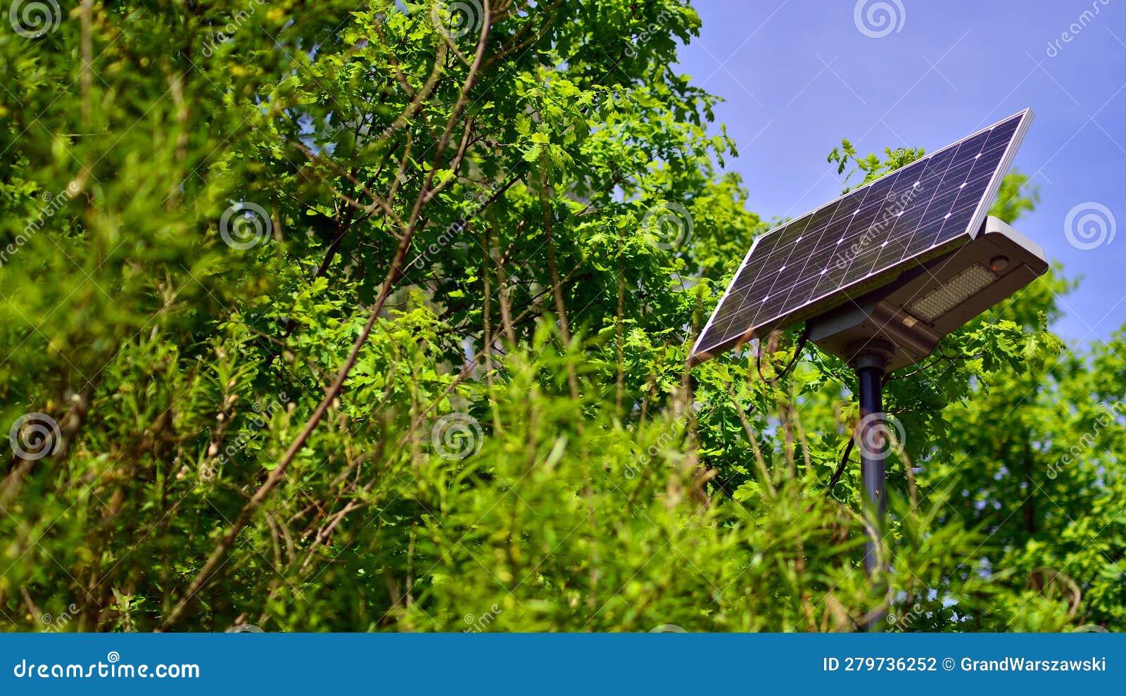 Street Light Powered by Solar Panel with Battery Included. Stock Photo