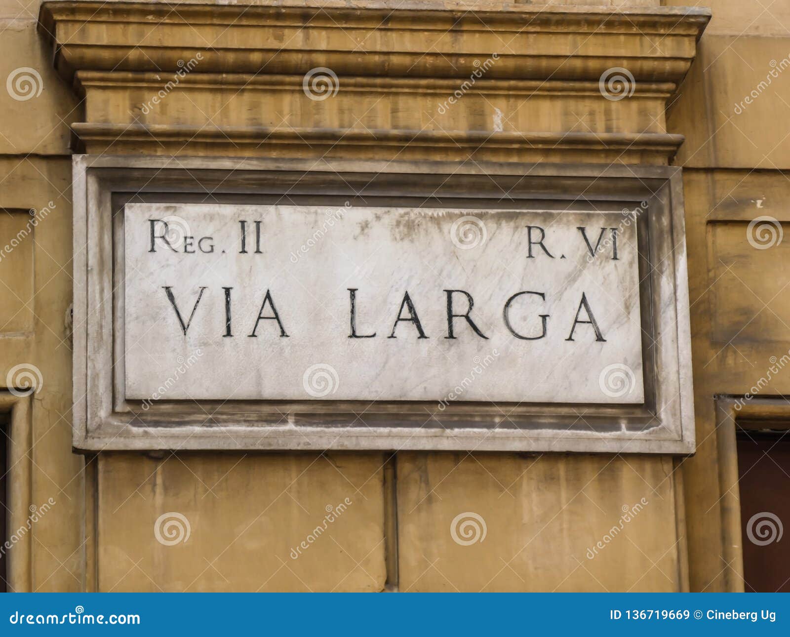 street name sign of via larga in rome, italy