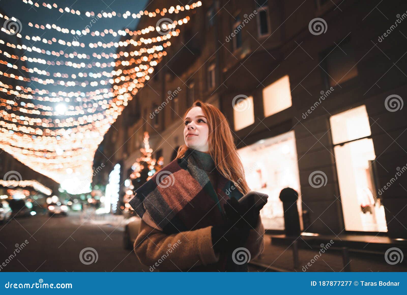 Street Night Portrait of a Cute Girl in Warm Clothes Walking Down the ...