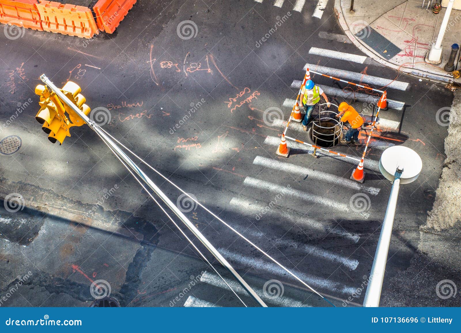 street scene with utility workers