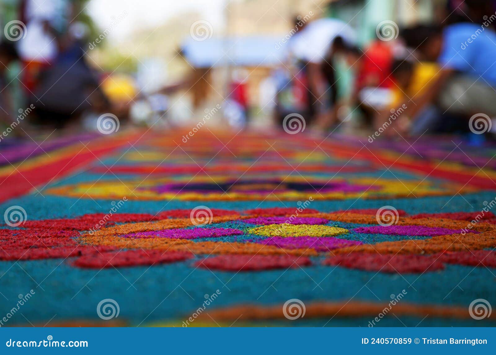 street screen of locals producing alfombra, sawdust carpets with colorful s for semana santa, easter on the streets of lake