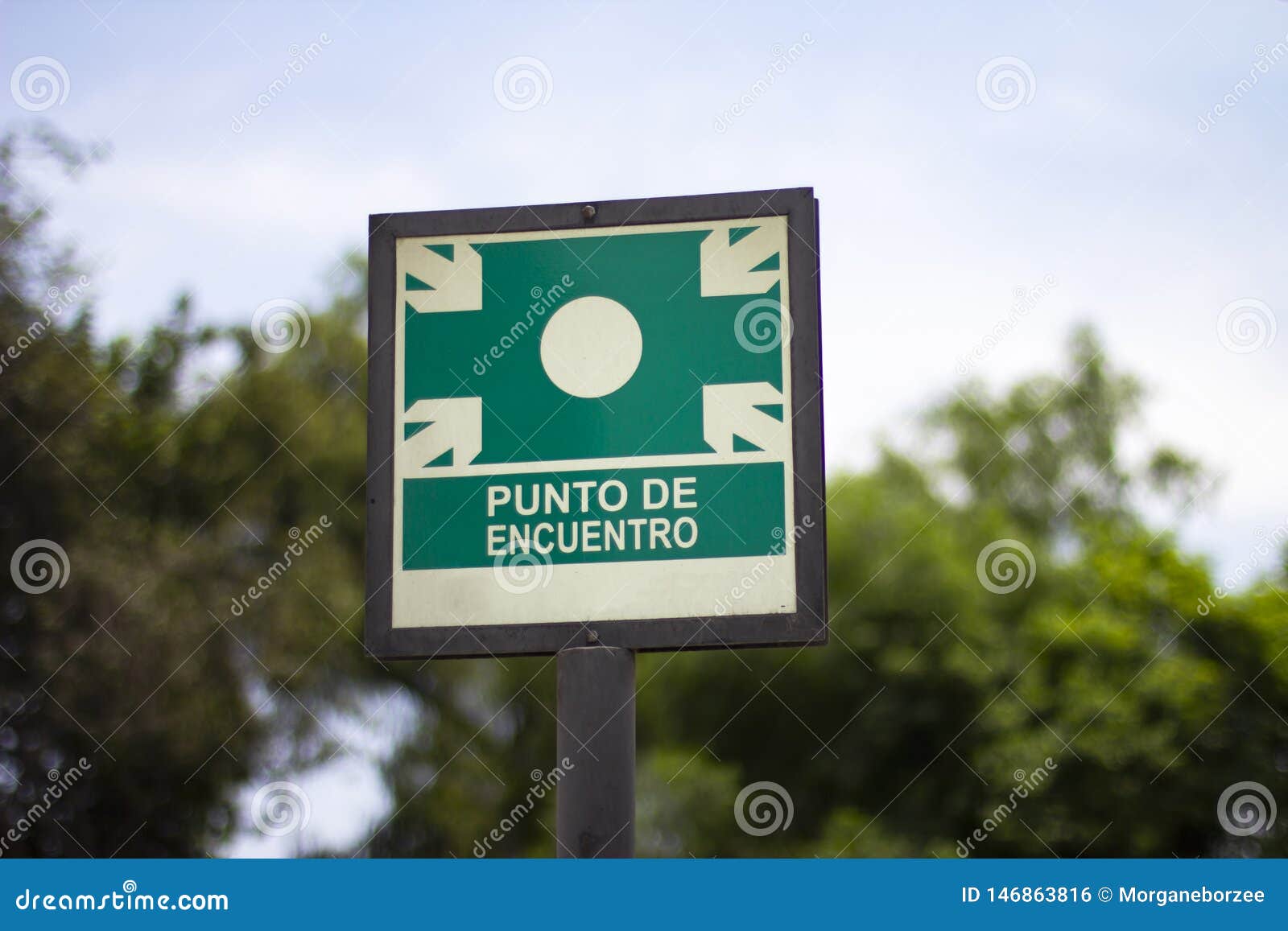 street sign of `punto de encuentro` meeting point