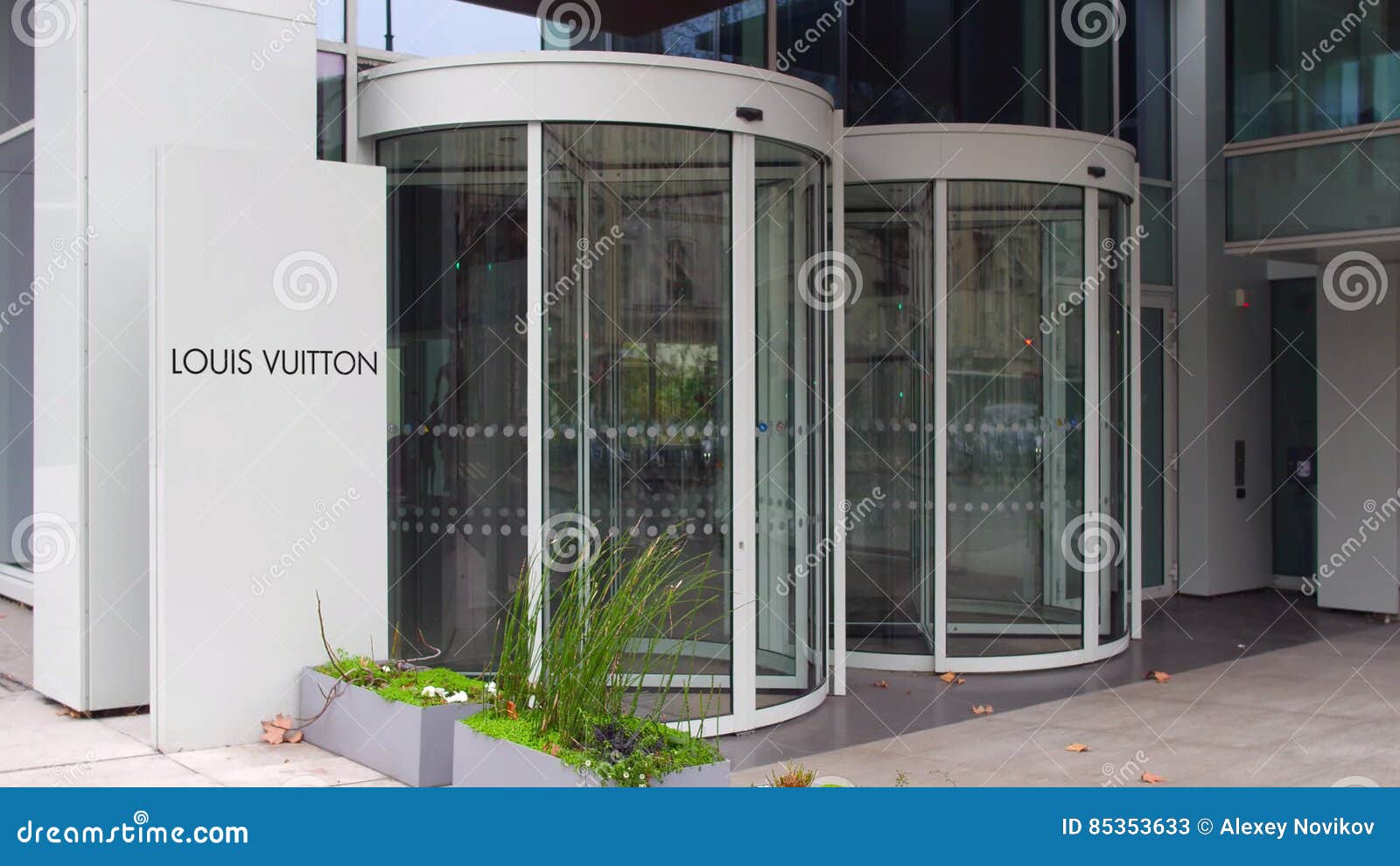 Street Signage Board With Louis Vuitton Logo. Modern Office Building. Editorial 3D Rendering ...