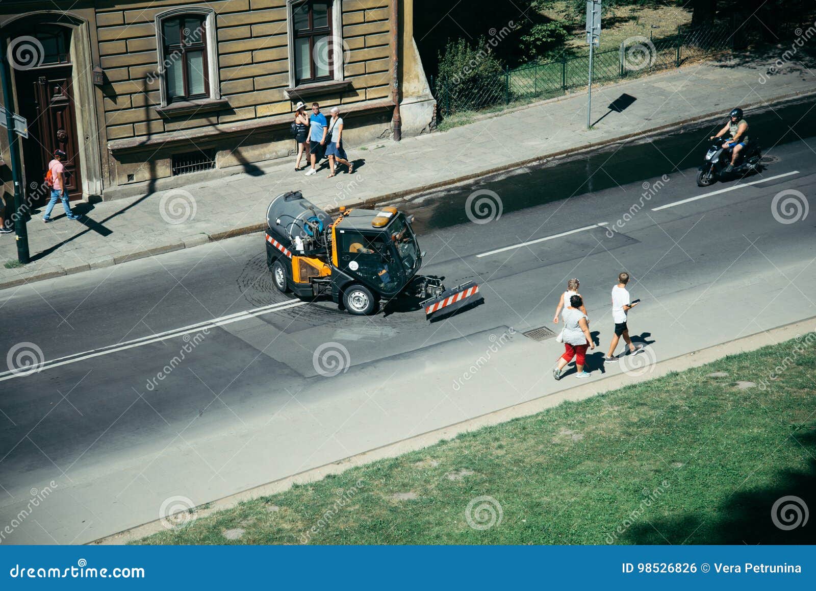 Street Sweeper Broom in the Middle of the Road Editorial Photo Image