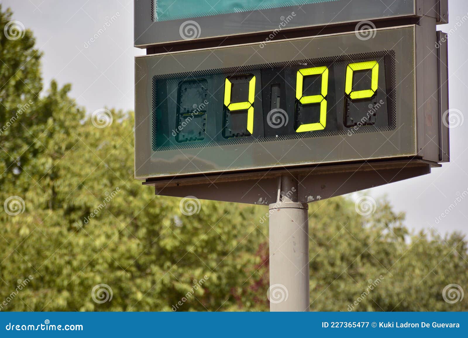 street thermometer marking 49 degrees