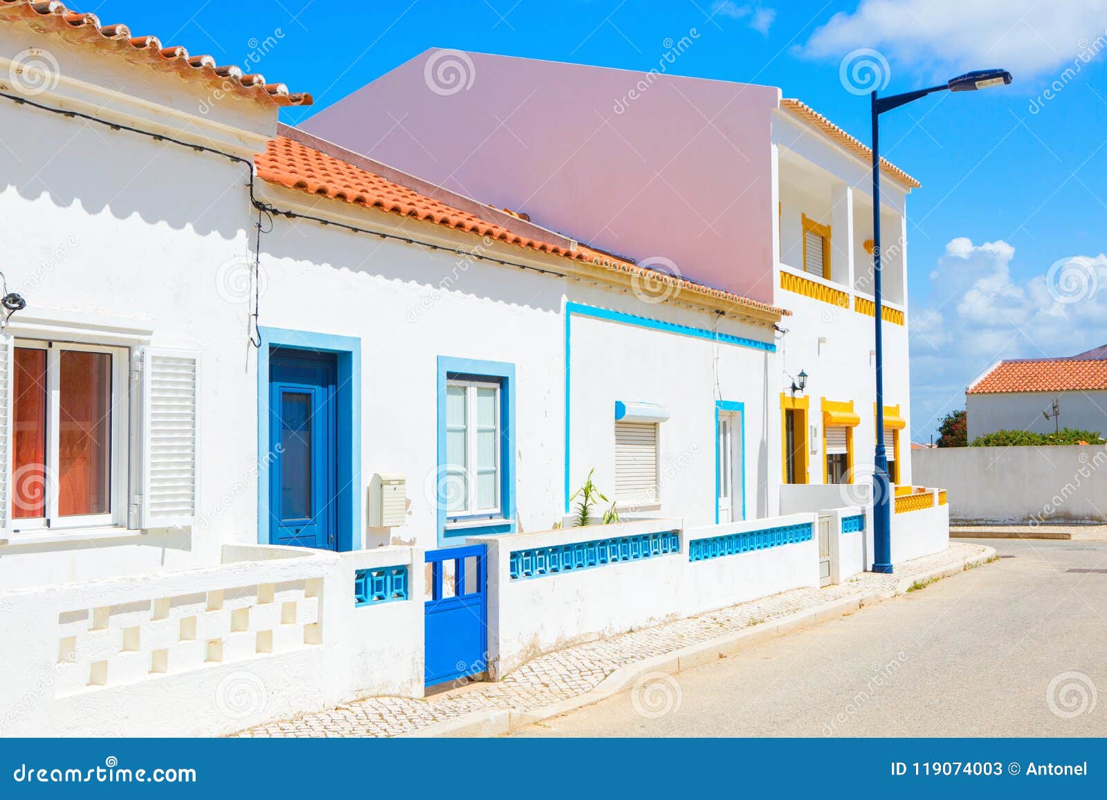 street with typical portuguese white houses in sagres, the municipality of vila do bispo, southern algarve of portugal