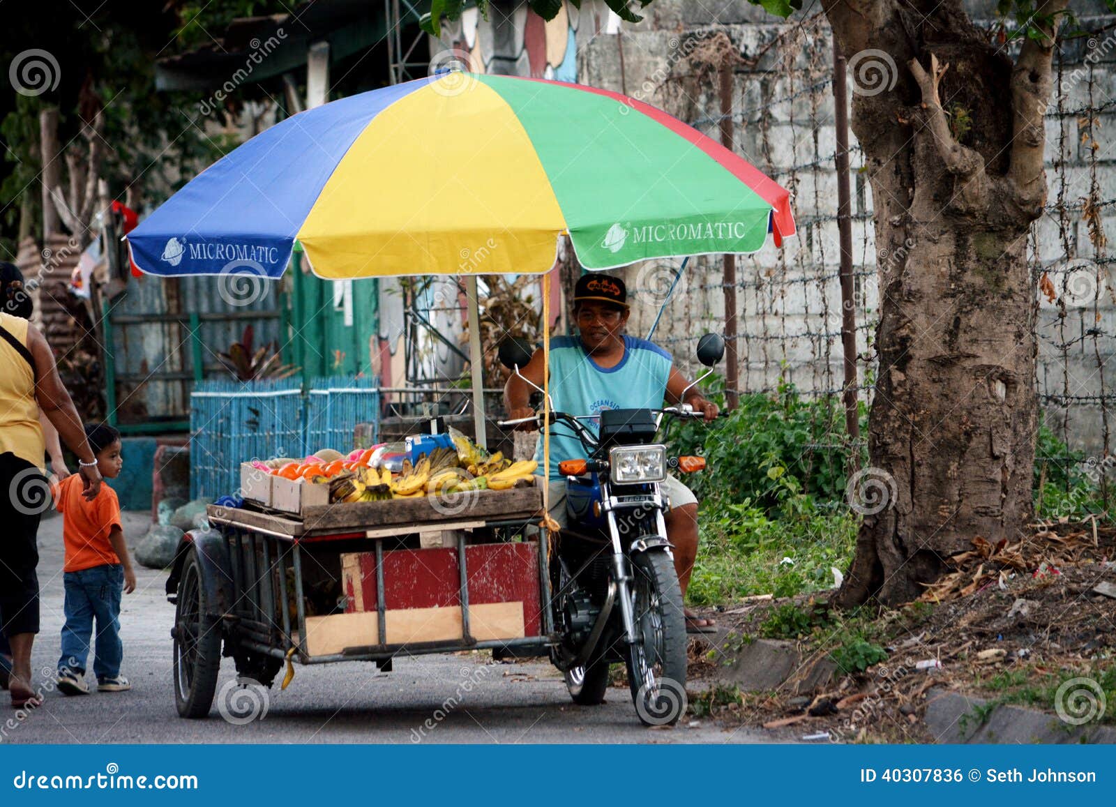 Philippine Street Vendor Sells Fried Chicken At Night Editorial Photo