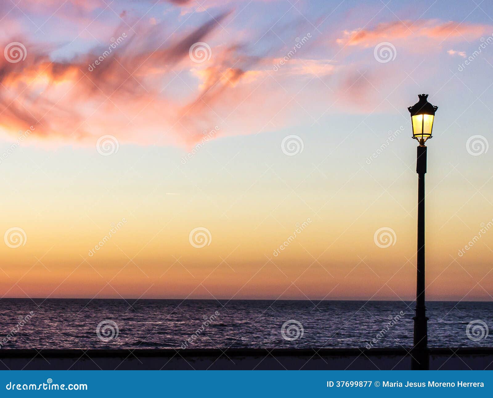 Streetlight Watching the Sunset Stock Image Image of monitor, street