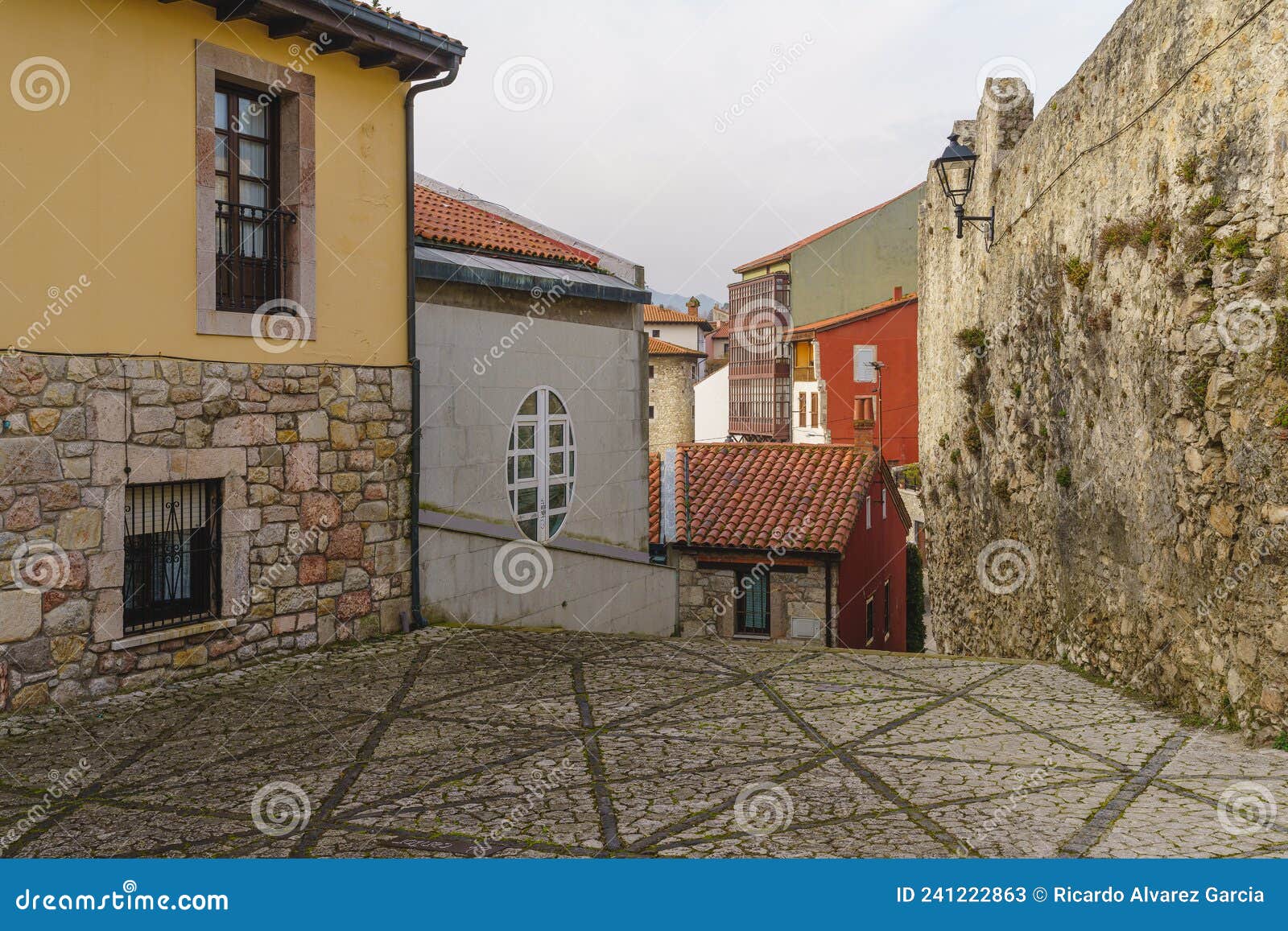 streets and buildings of the tourist town of llanes, in asturias, spain.