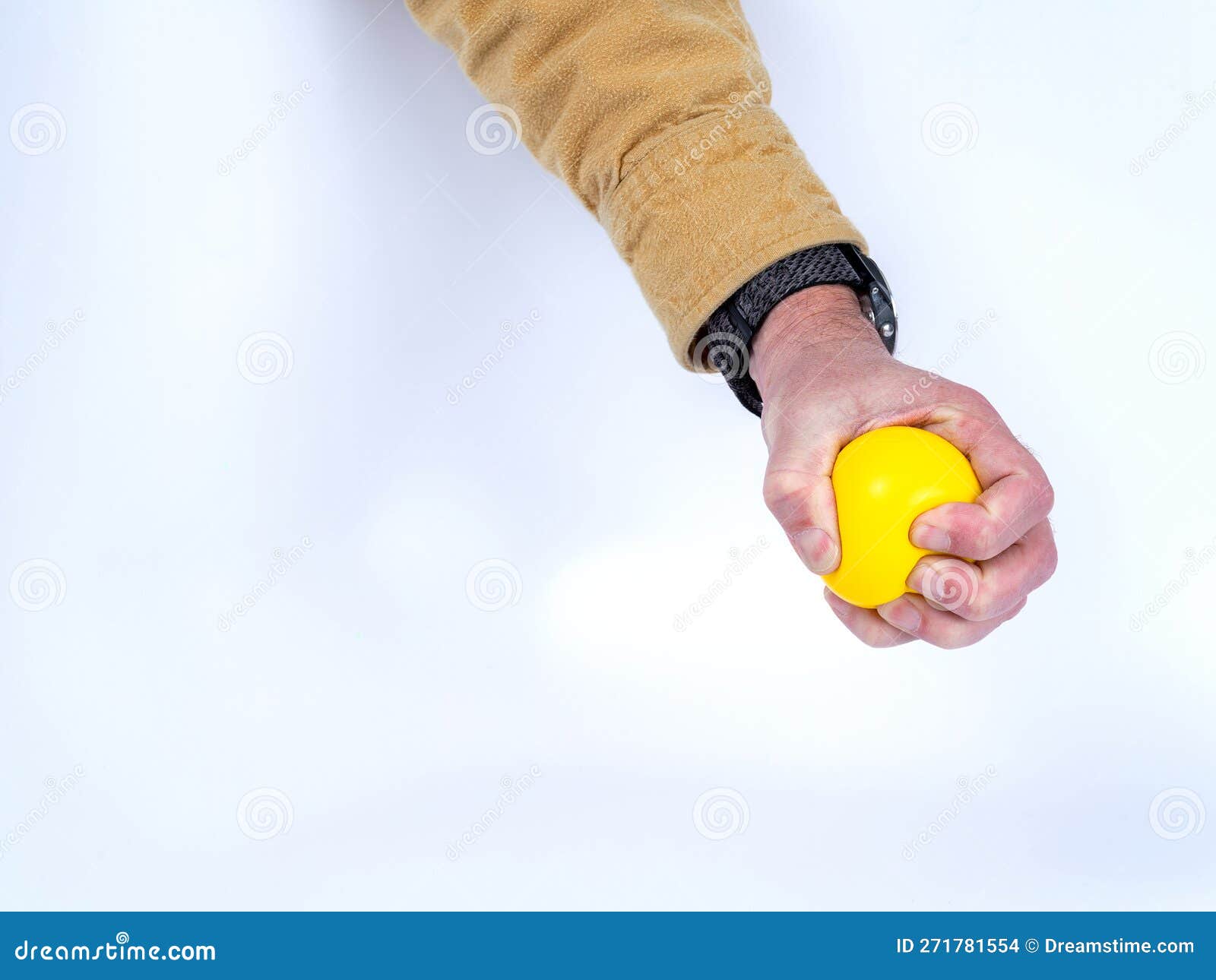 Stress Relief with a Yellow Rubber Ball Stock Photo Image of fingers