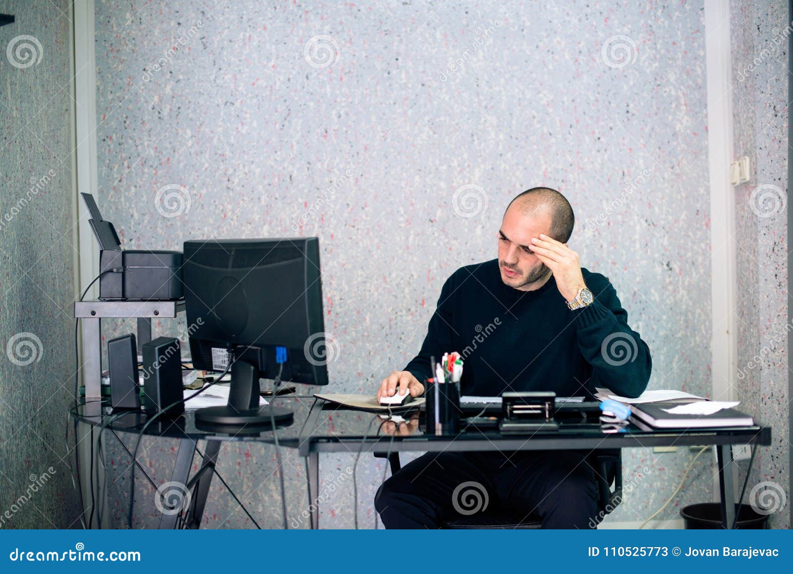 stressed businessman working in his office