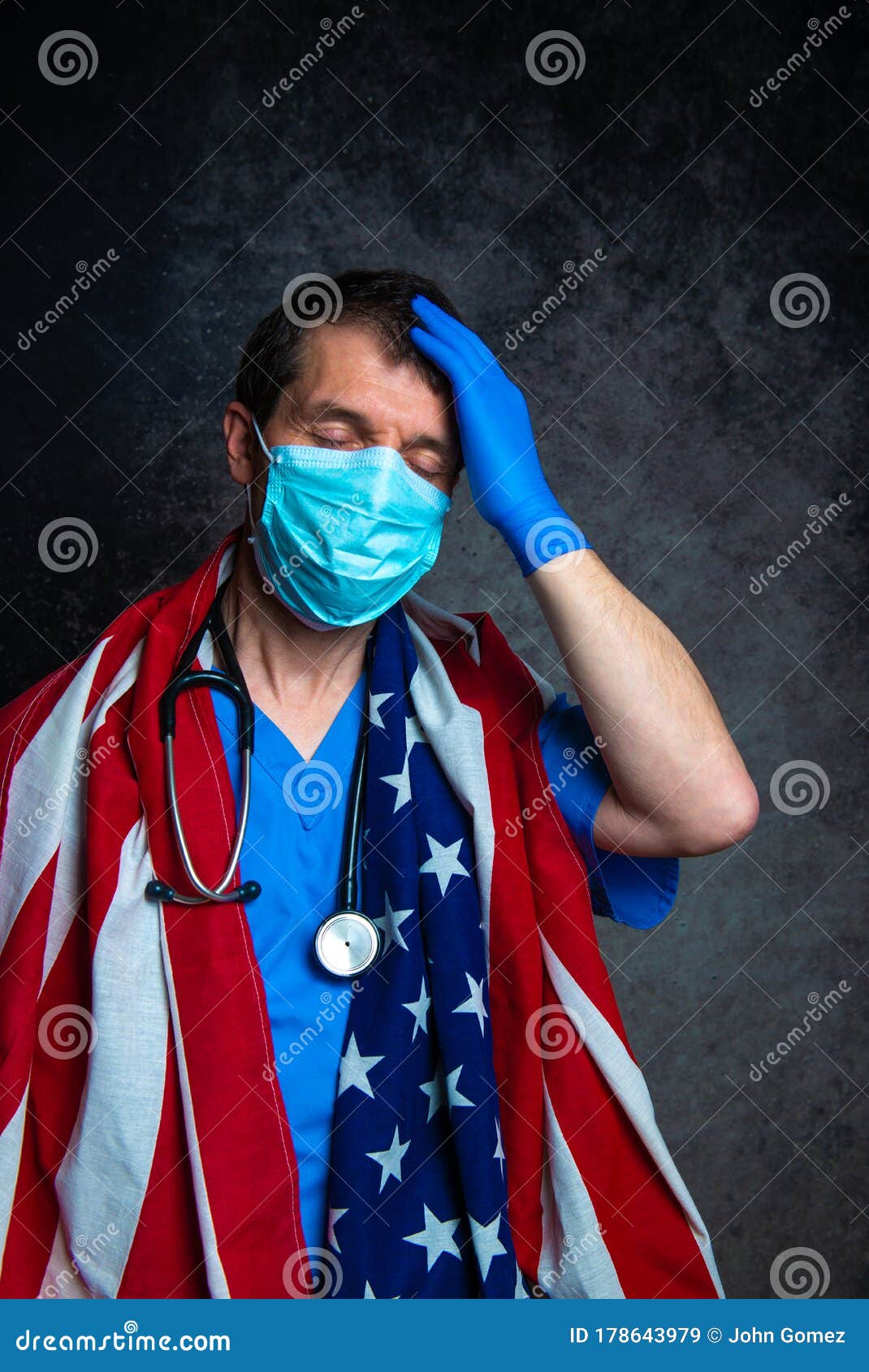 Stressed Doctor with Hand on Head, Wearing Face Mask and Holding the ...