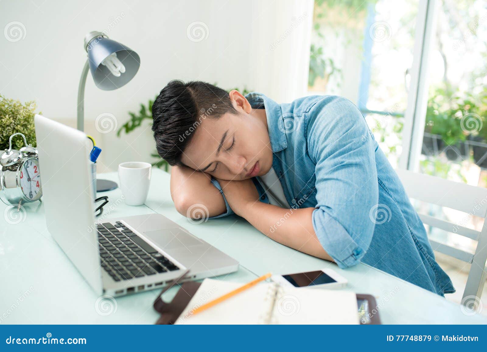 Stressed Overworked Man Studying Sleepy On Desk Stock Image