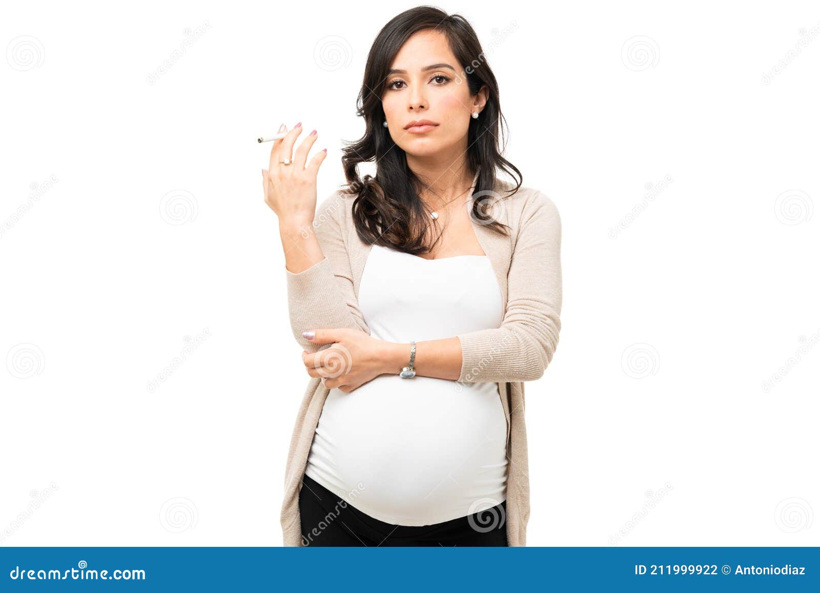 Pregnant woman breaks cigarette in half, says no to smoking Stock Photo by  ©SIphotography 51627555