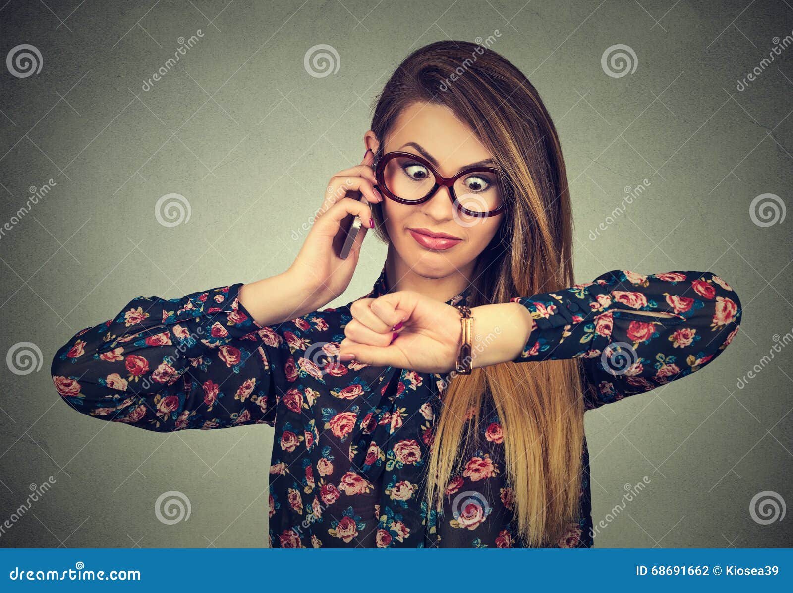 stressed surprised business woman looking at wrist watch, running late for meeting