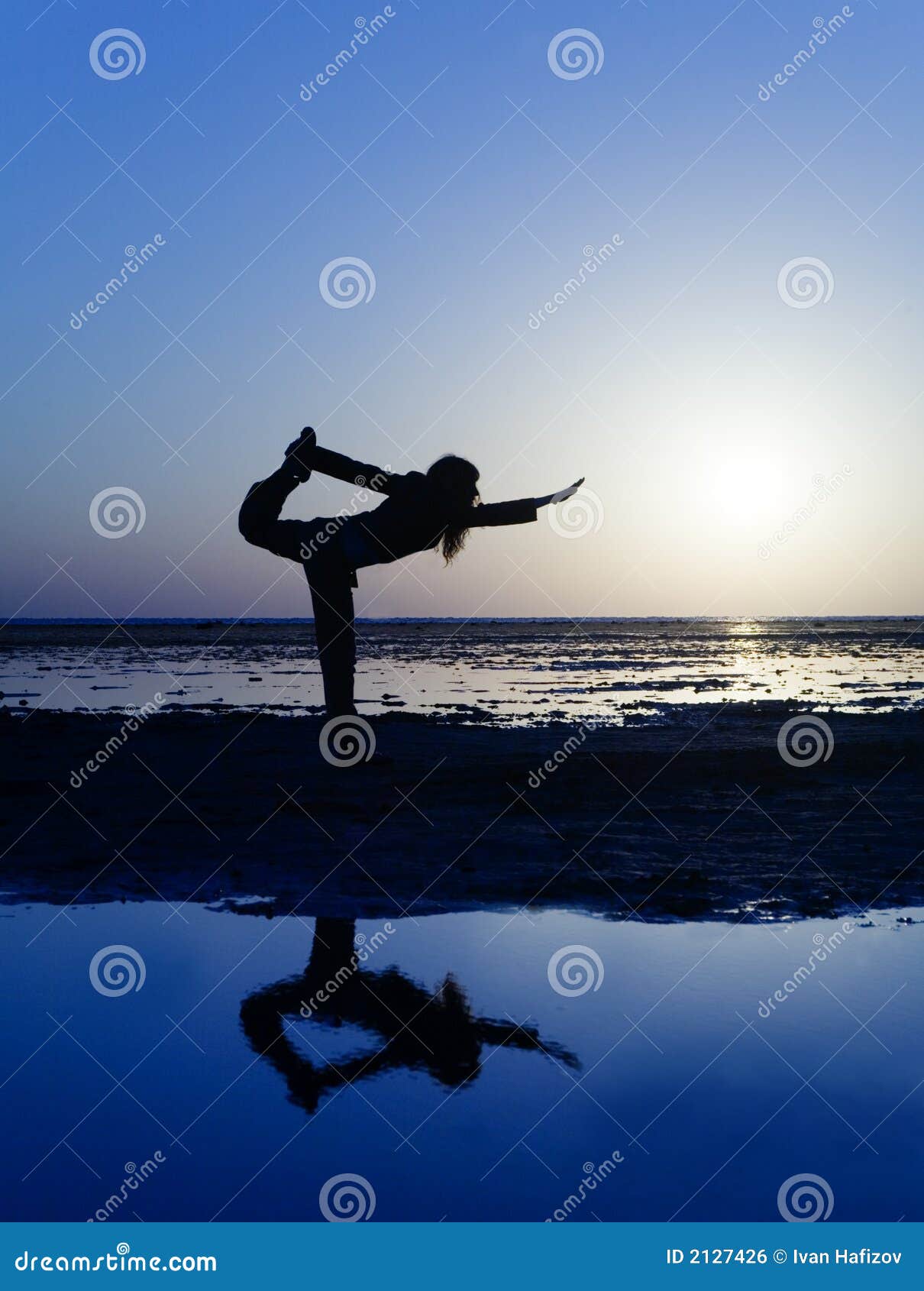 Stretching on the beach stock photo. Image of rising, mornint - 2127426