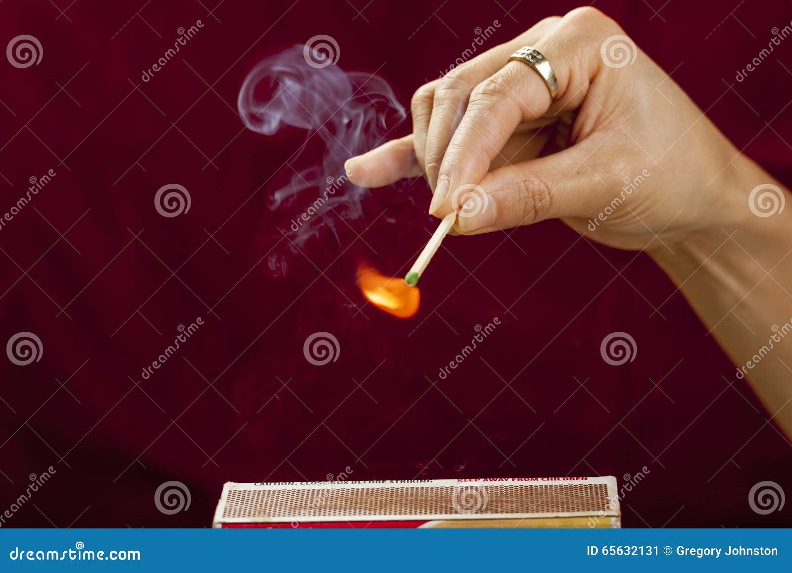 Striking a match. stock image. Image of ignite, light 65632131