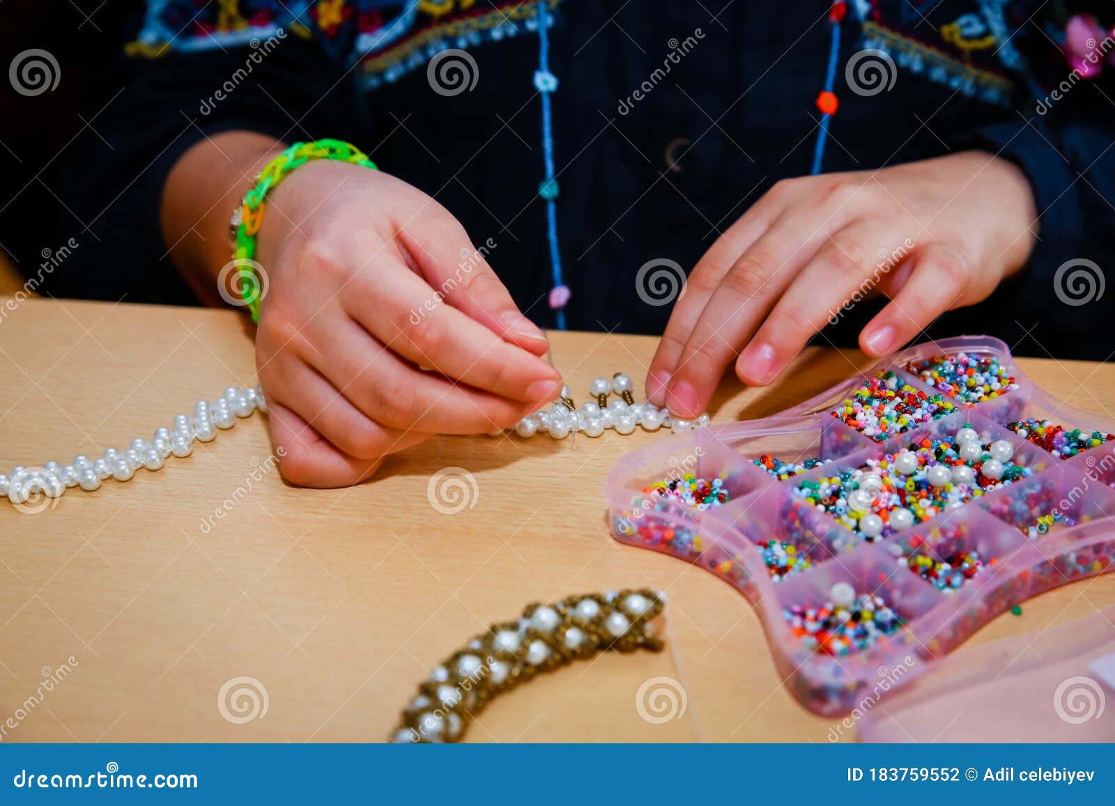 STRING BEADS with SMALL HOLES . the Child Puts the Beads in His Hand Stock Photo Image of