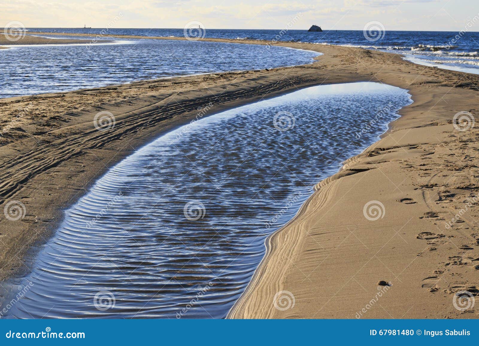 Strip of land 2. stock photo. Image of breakwater, adult 67981480