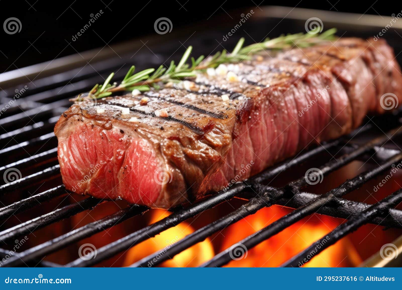 A Strip Steak with Grill Lines on a Hot Metal Rack Stock Photo Image of strip, steak 295237616
