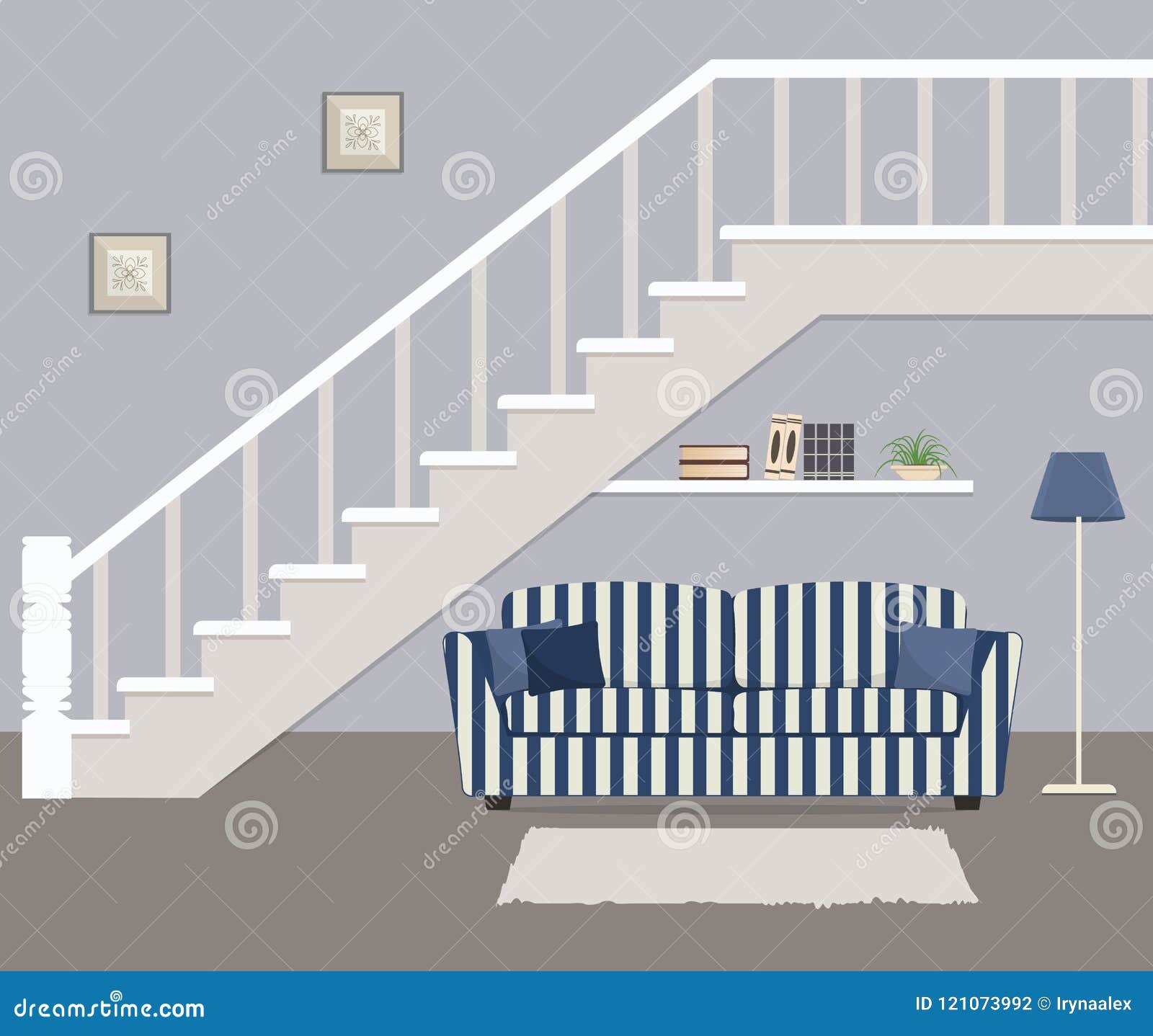 Striped Blue Sofa With Pillows Located Under The Stairs Stock