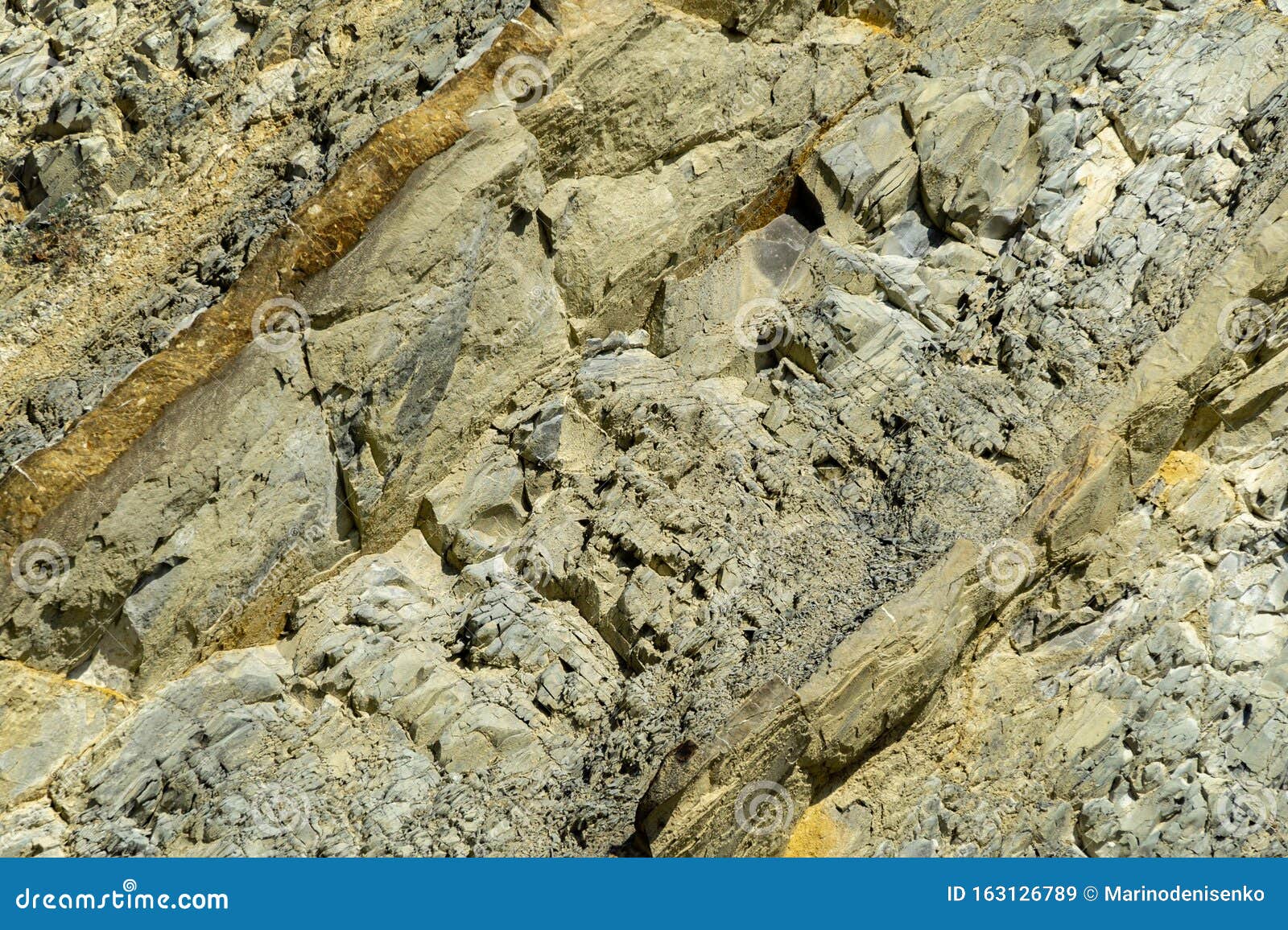 striped natural texture of stones and rock fragments on caucasus mountains on black sea coast in olginka as original texture
