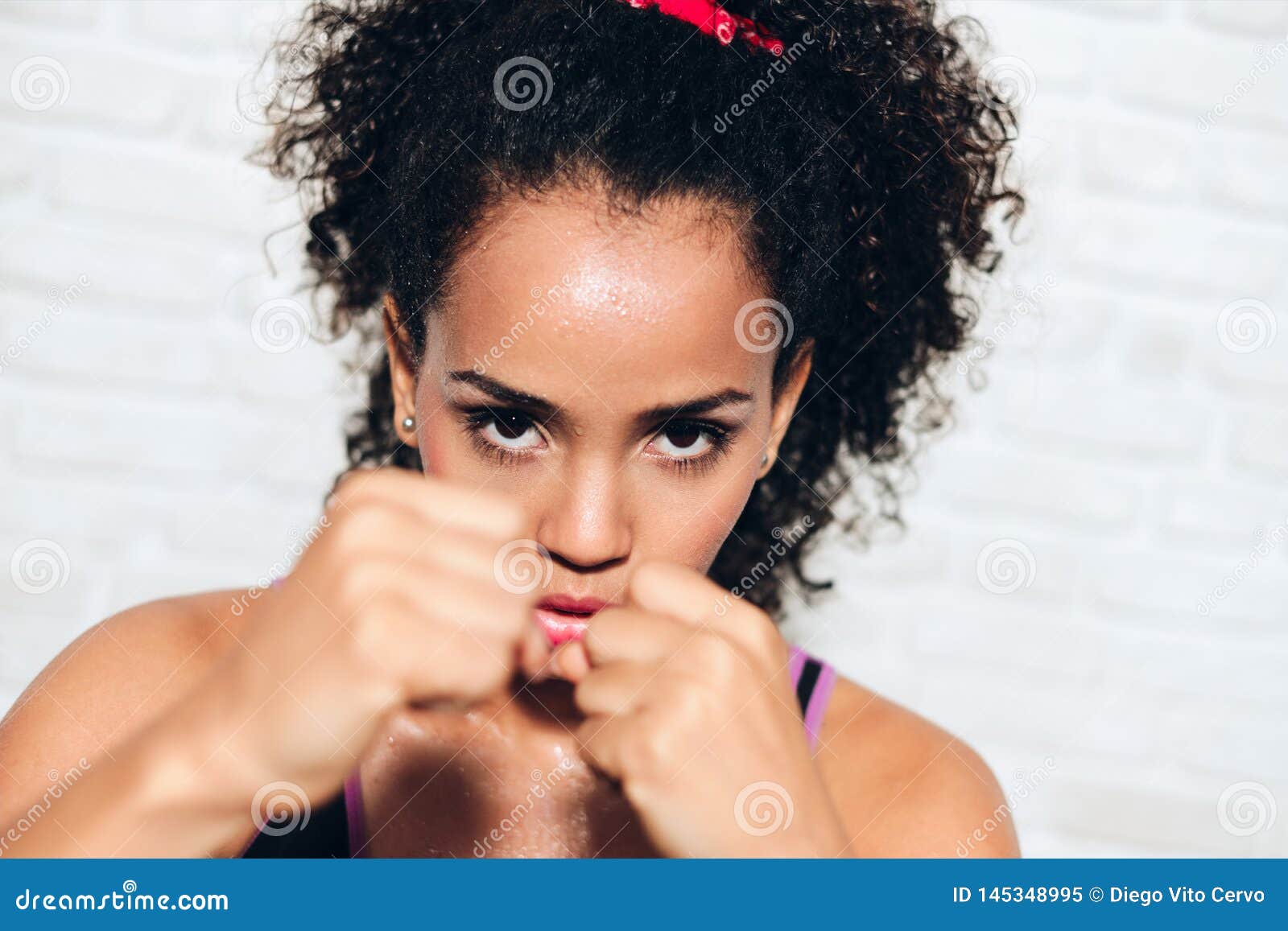 strong african american girl black woman fighting for self defense