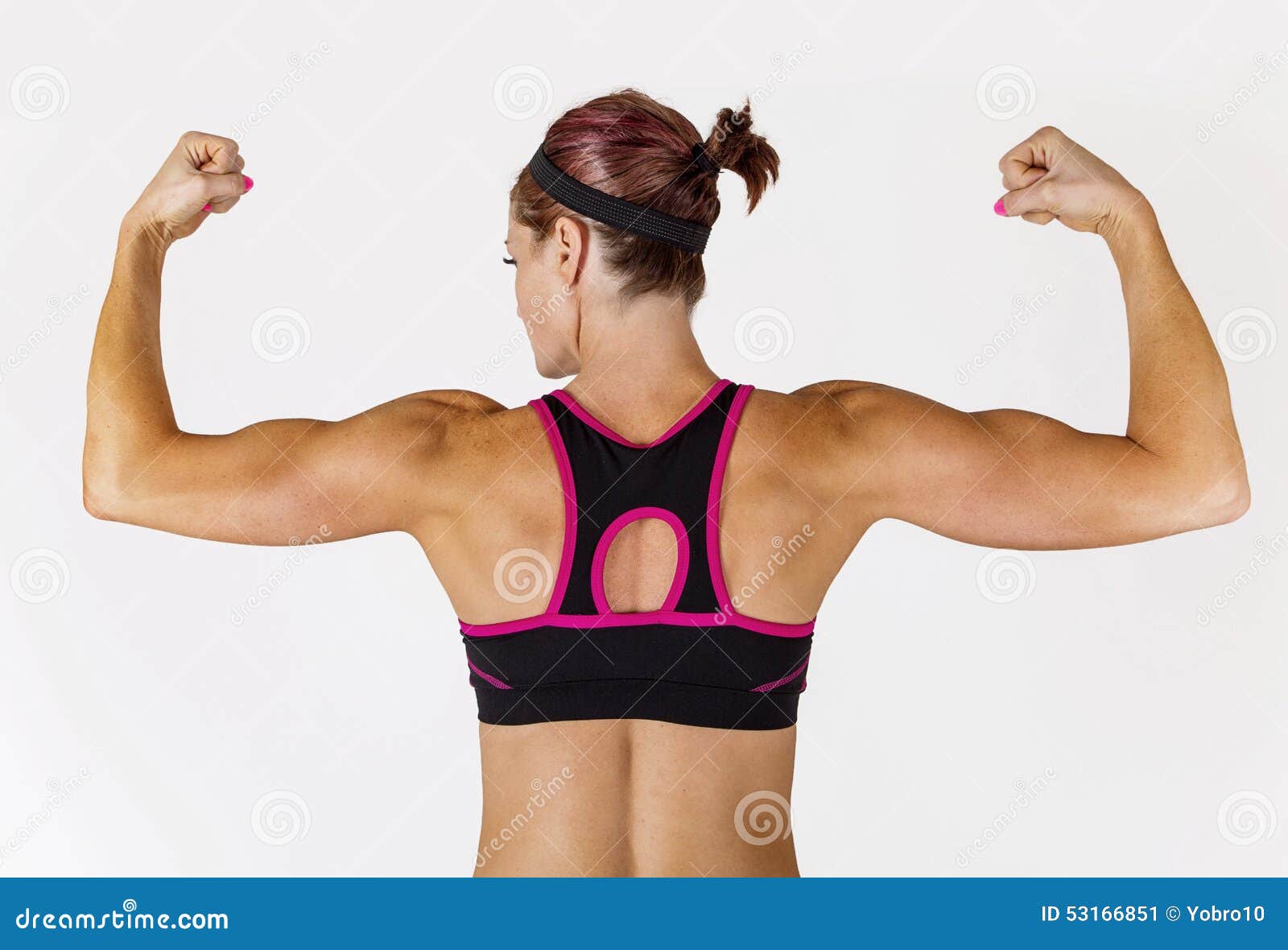 Strong Beautiful Fitness Woman Flexing Her Arm and Back Muscles