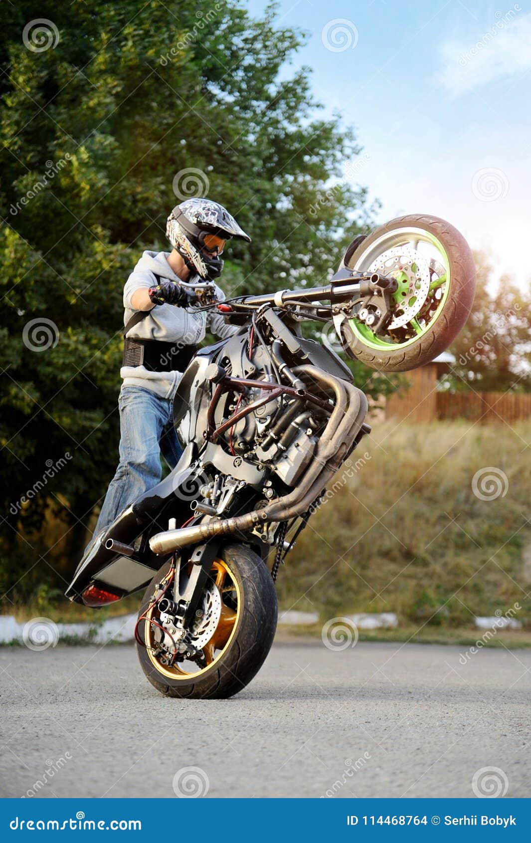 motorcycle on one wheel