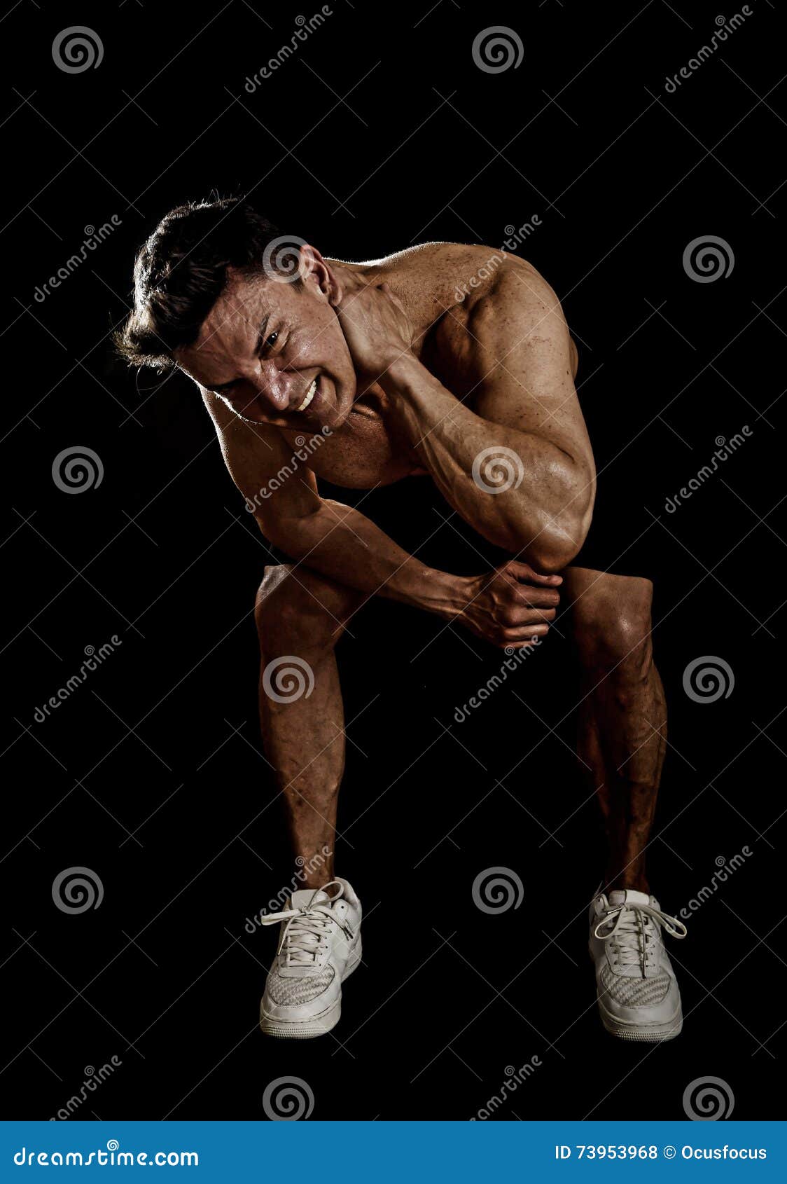 Strong Fit Man with Ripped Body Doing Squat Exercises Showing Defined  Shoulders and Biceps Stock Photo - Image of musculature, ripped: 73953968