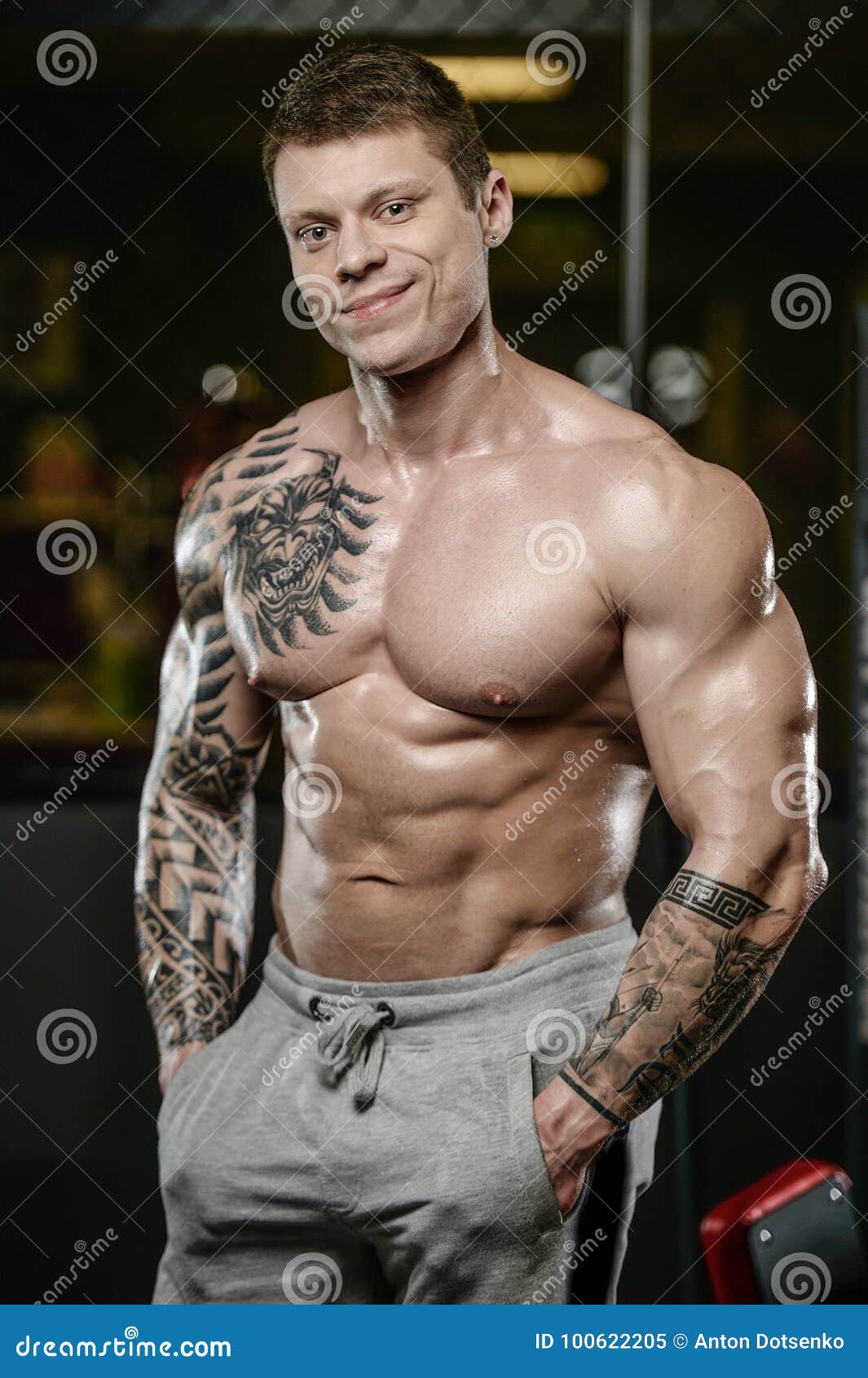 Strong and Handsome Athletic Young Tattoo Man with Muscles Stock Image -  Image of bodybuilding, loss: 100622205