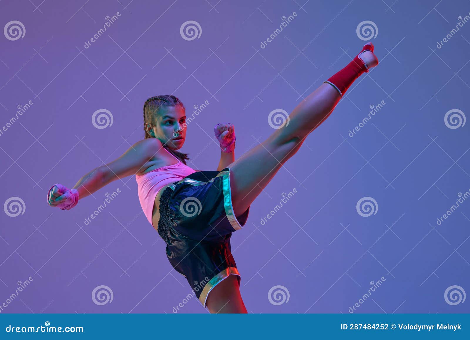 Strong Legs. MMA Fighter, Teen Girl Training, Kicking with Leg Against ...