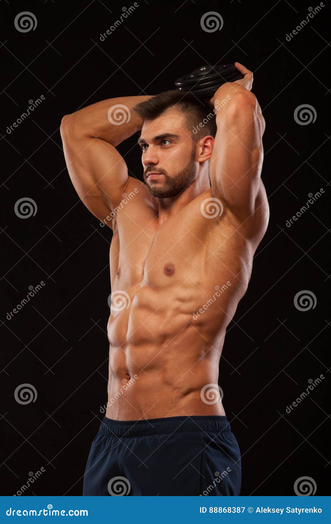 Strong Man Making Exercises on Triceps with a Dumbbell. Close Up Shot ...