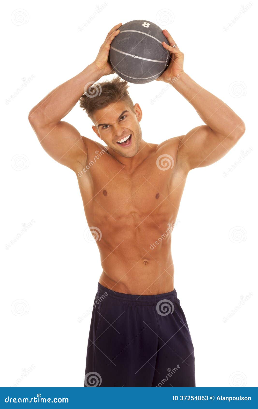 Strong Man with Medicine Ball Over Head Stock Image Image of
