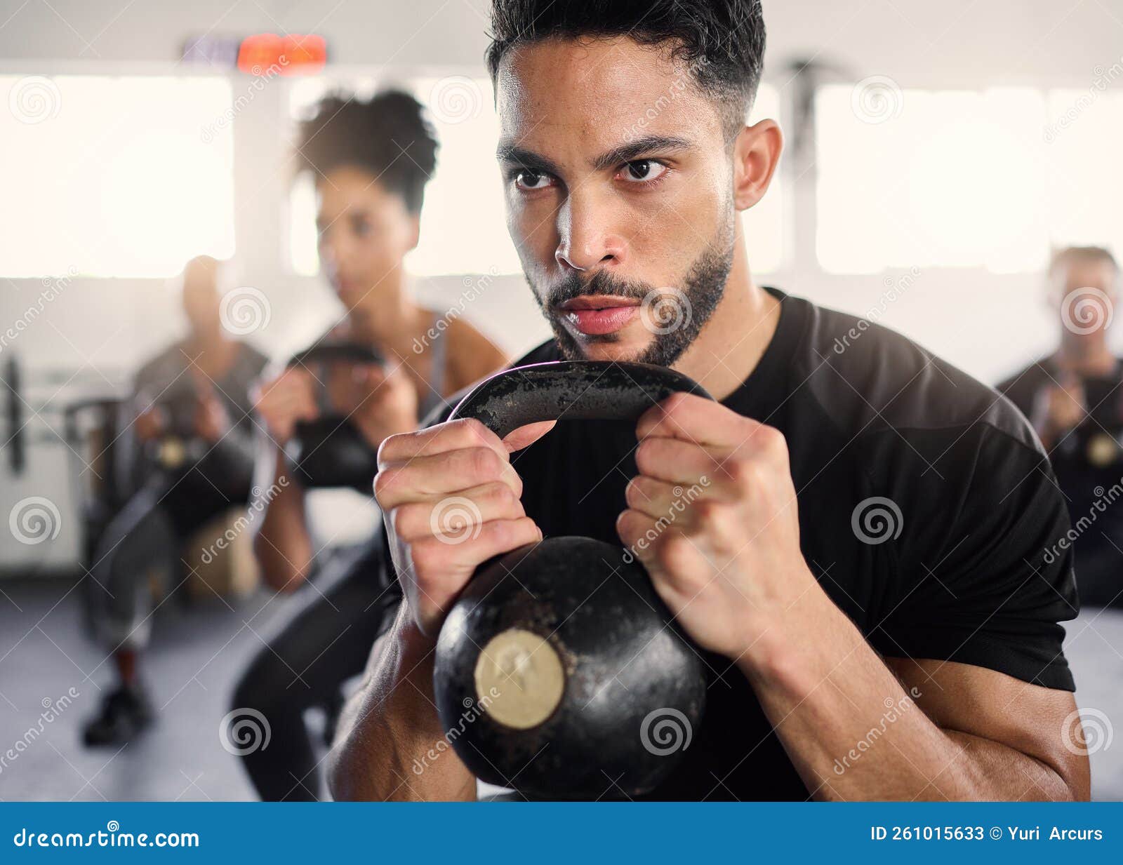 Strong Man, Personal Trainer and Group Training with Kettlebell Squat