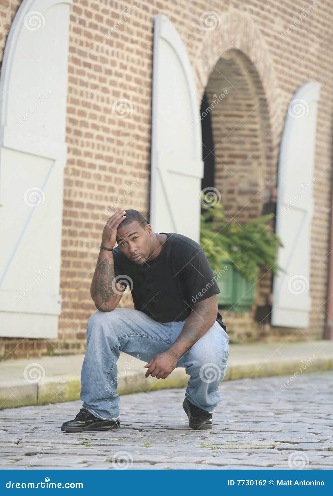 Strong man on street stock photo. Image of happy, outdoors 7730162