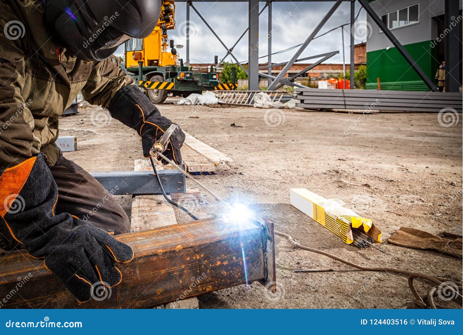 A strong man welder stock photo. Image of bright, protection 124403516