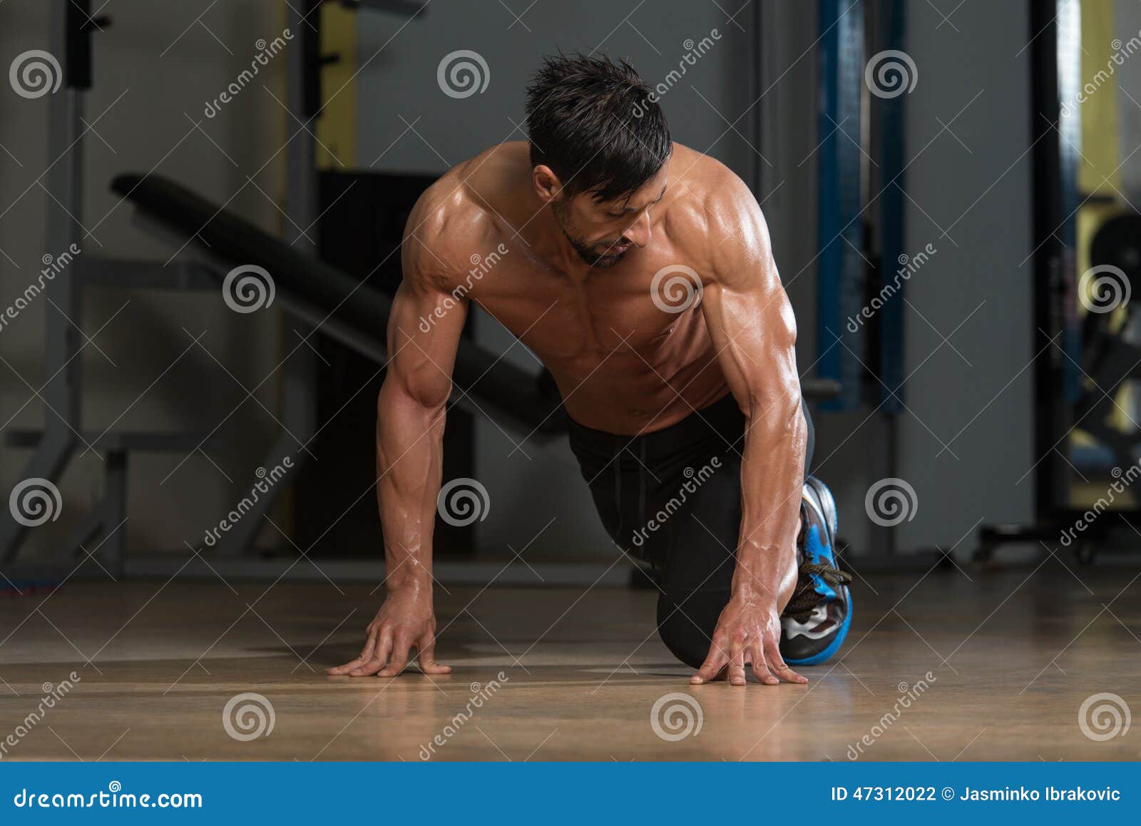 Strong Muscular Men Kneeling on the Floor Stock Photo Image of model