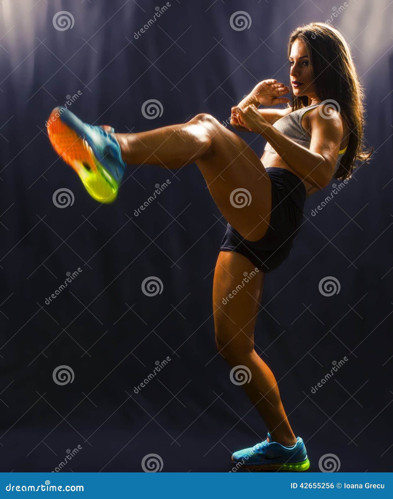 strong sports woman training martial arts