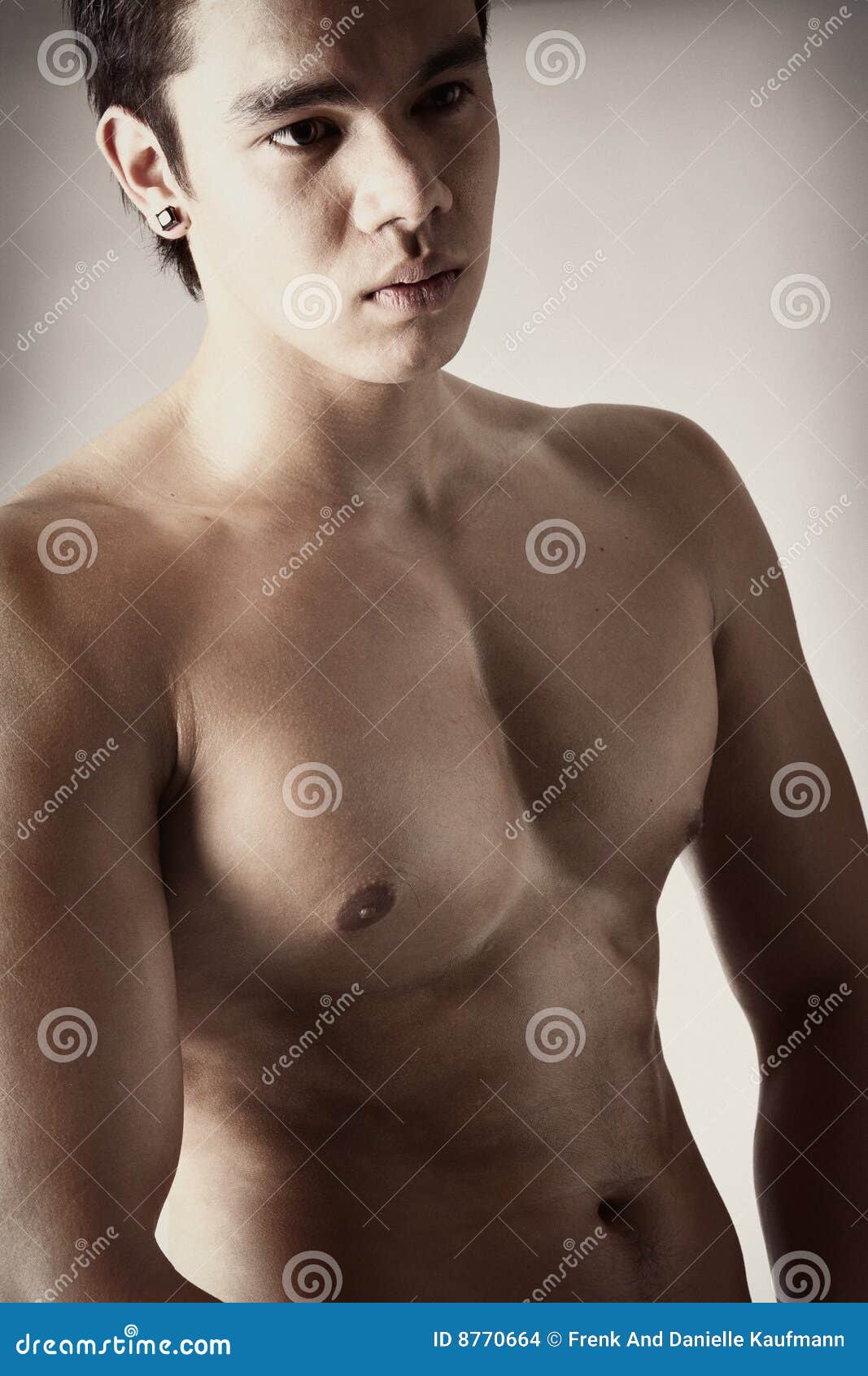 Trendy Muscular Guy Posing In Style Stock Photo - Image of 