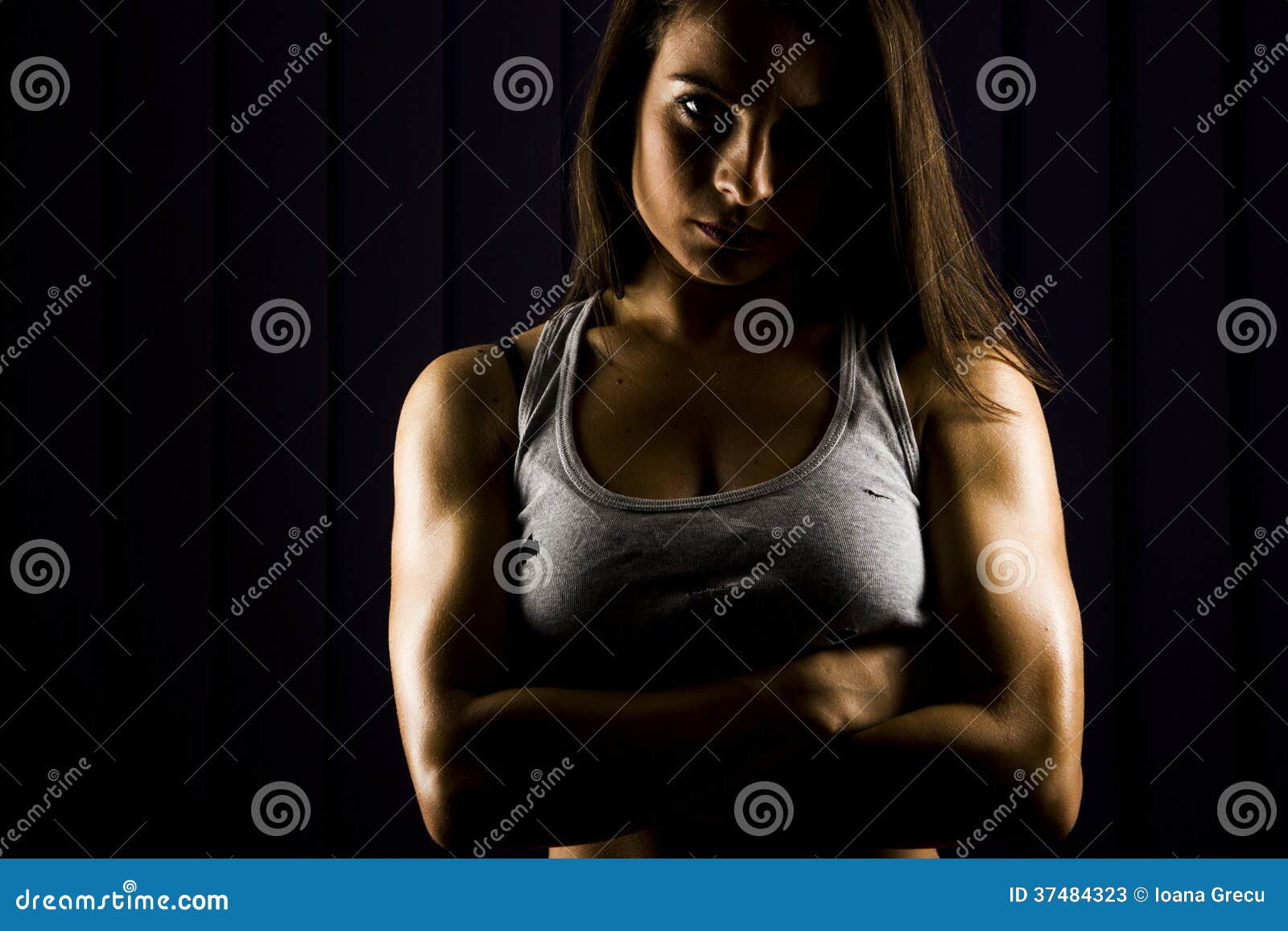 strong, very fit young woman