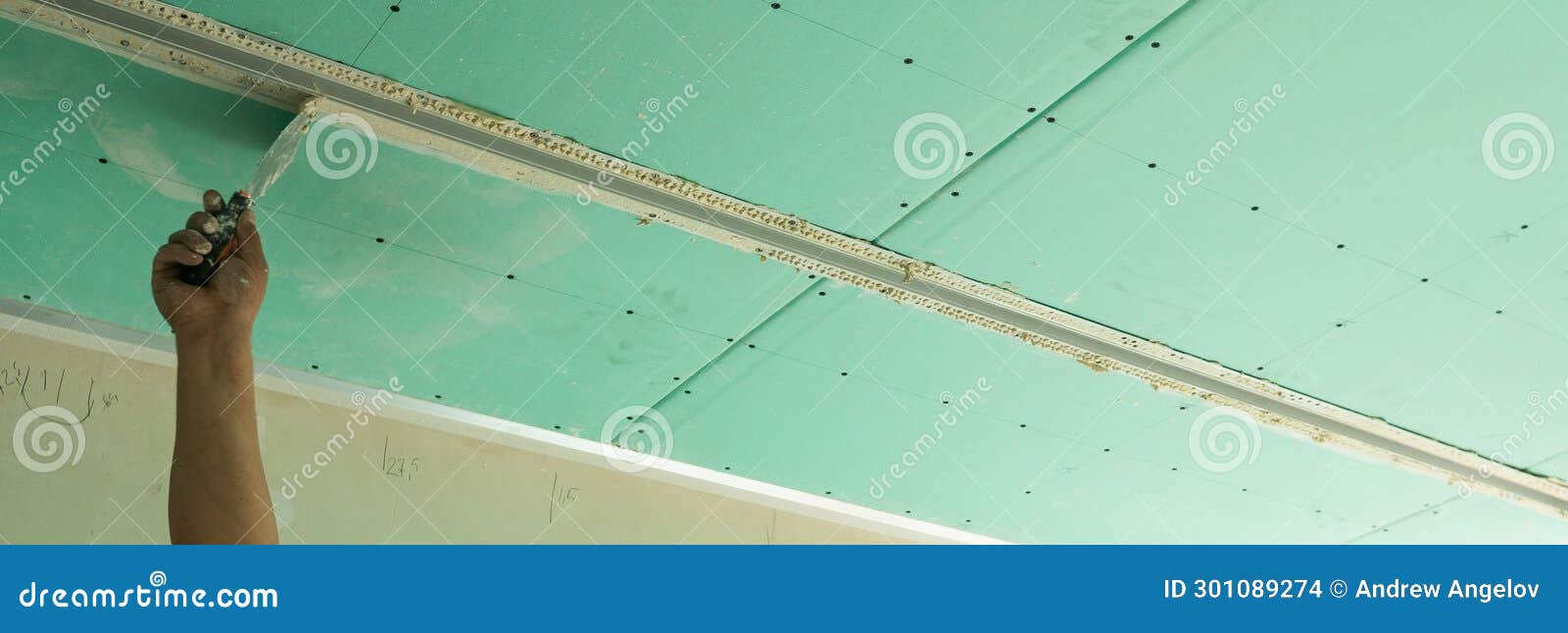 Installation Of Gypsum Drywall Boards Around An Attic Skylight Window