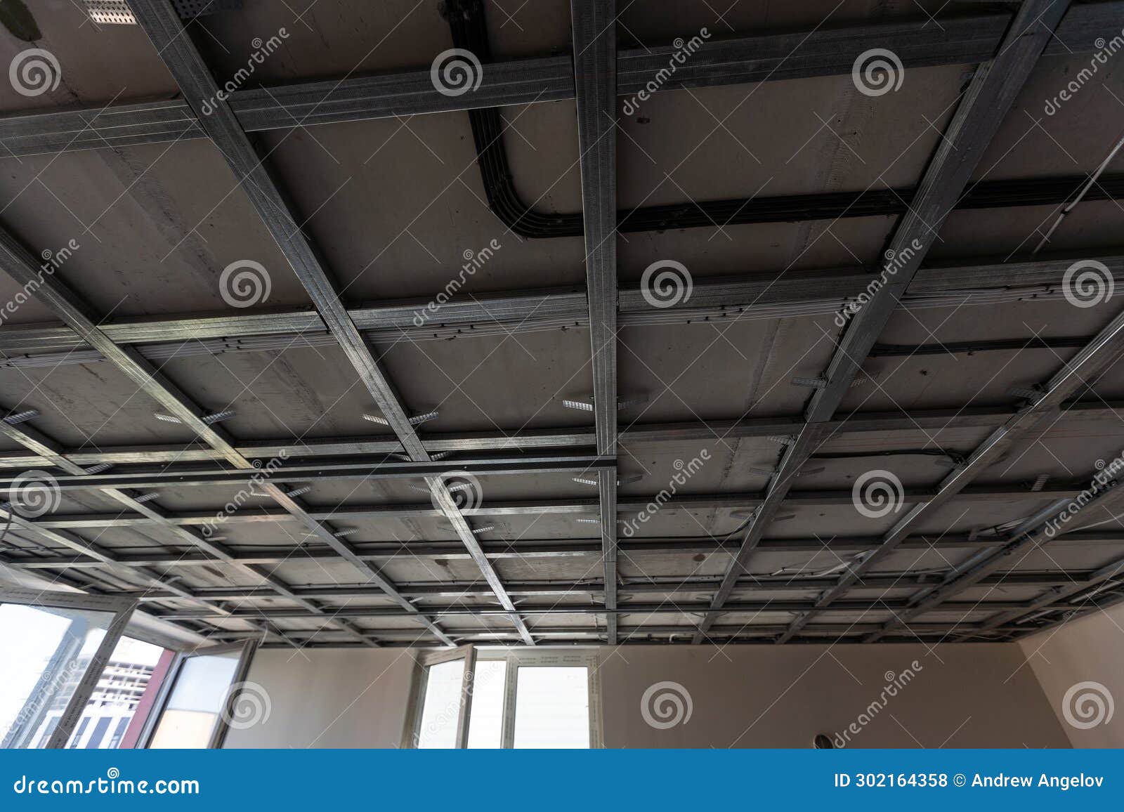 Installation Of Gypsum Drywall Boards Around An Attic Skylight Window