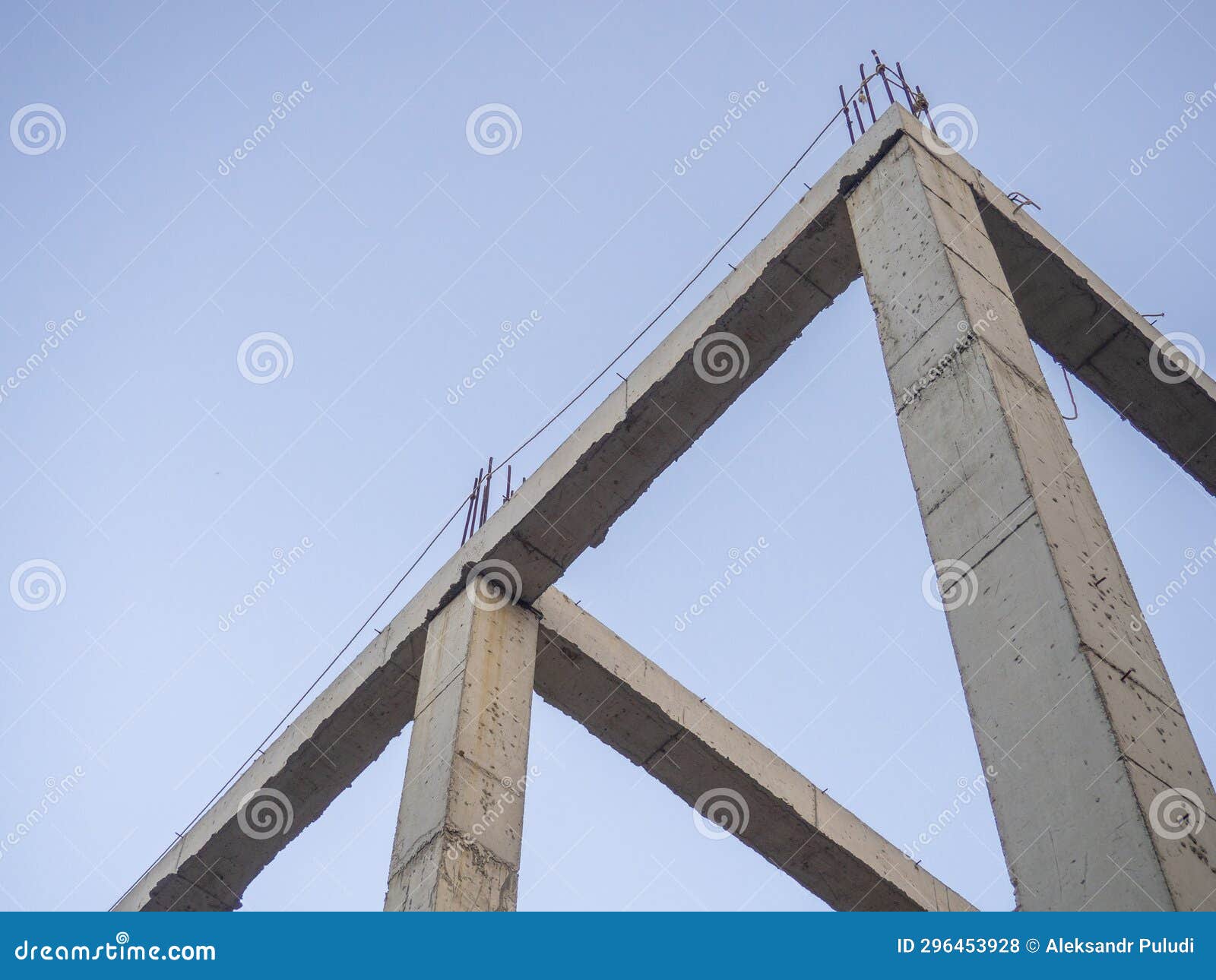 Structure Made of Concrete Piles. Frame of a House Under Construction