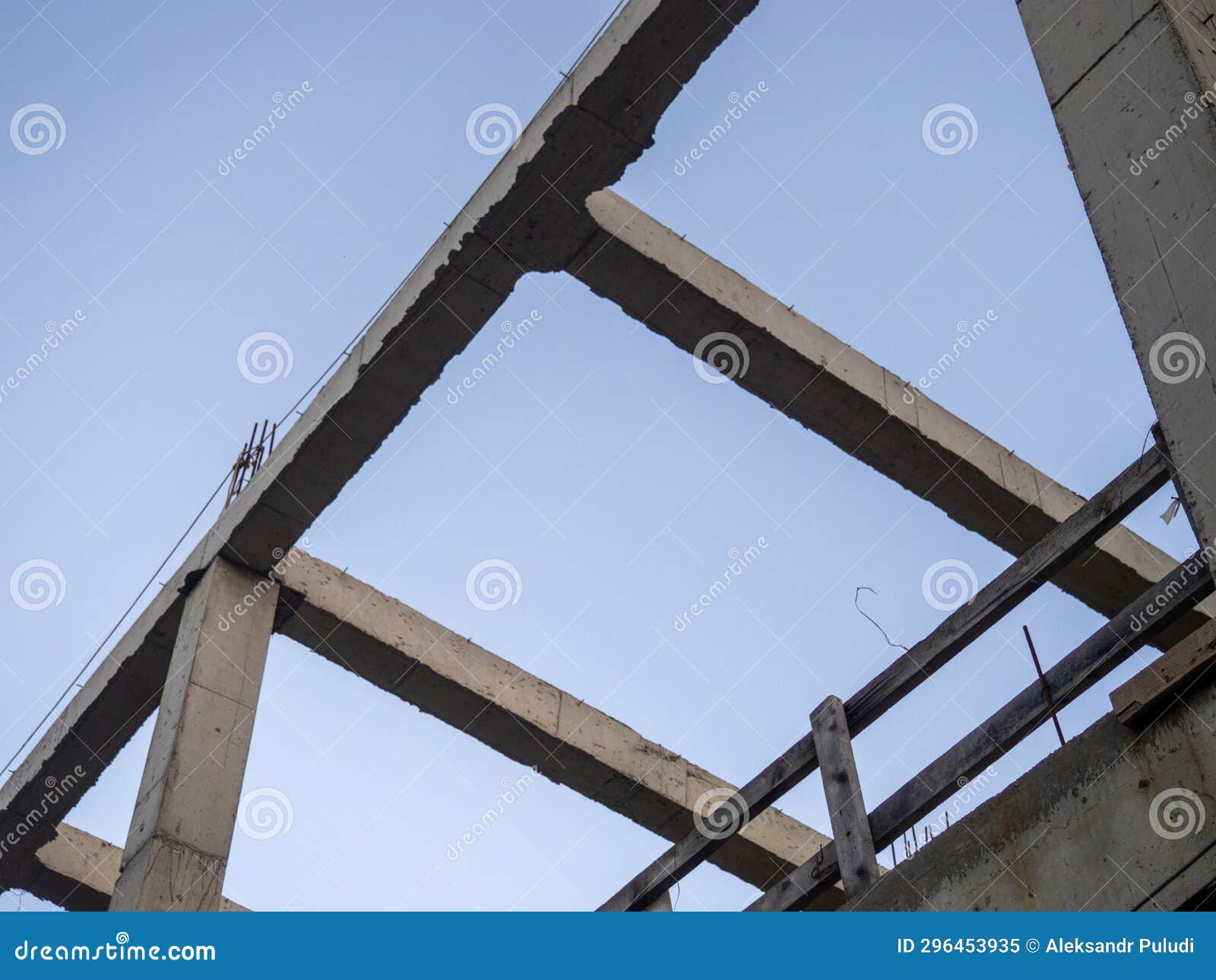 Structure Made of Concrete Piles. Frame of a House Under Construction