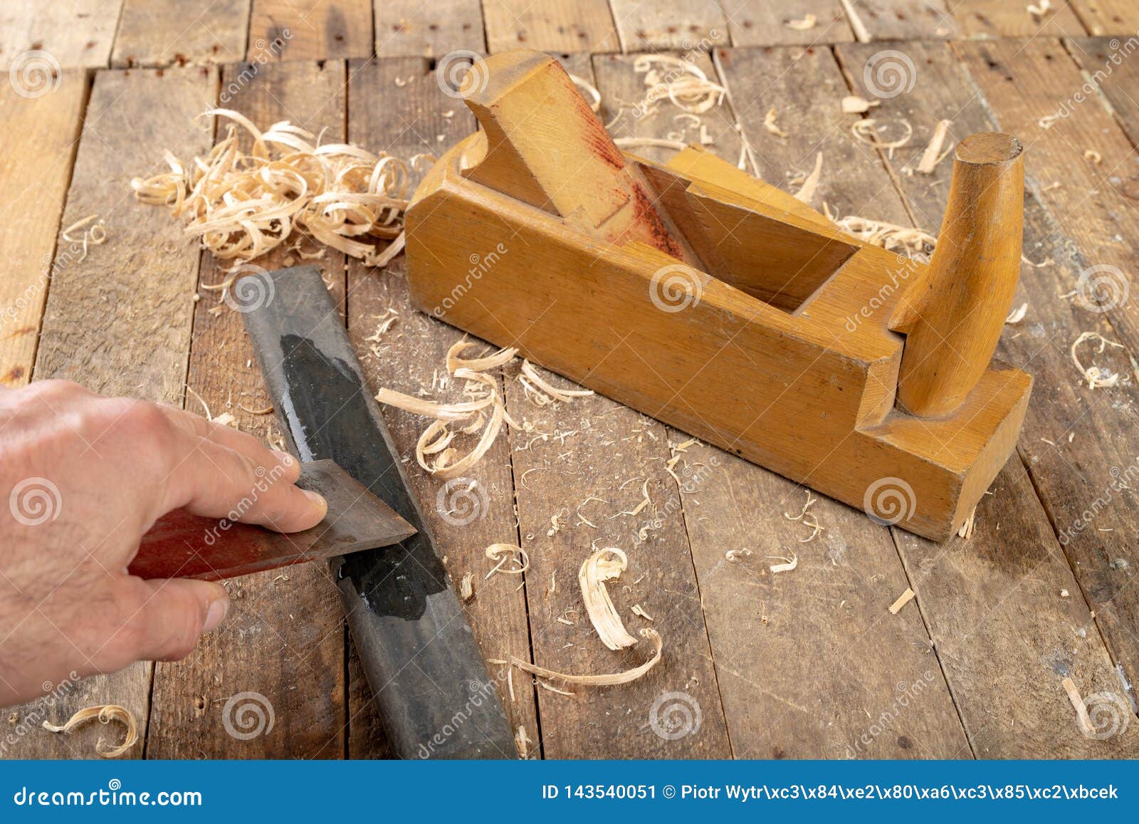 Strug in an old carpentry workshop. Sharpening and conservation of the old carpentry tool