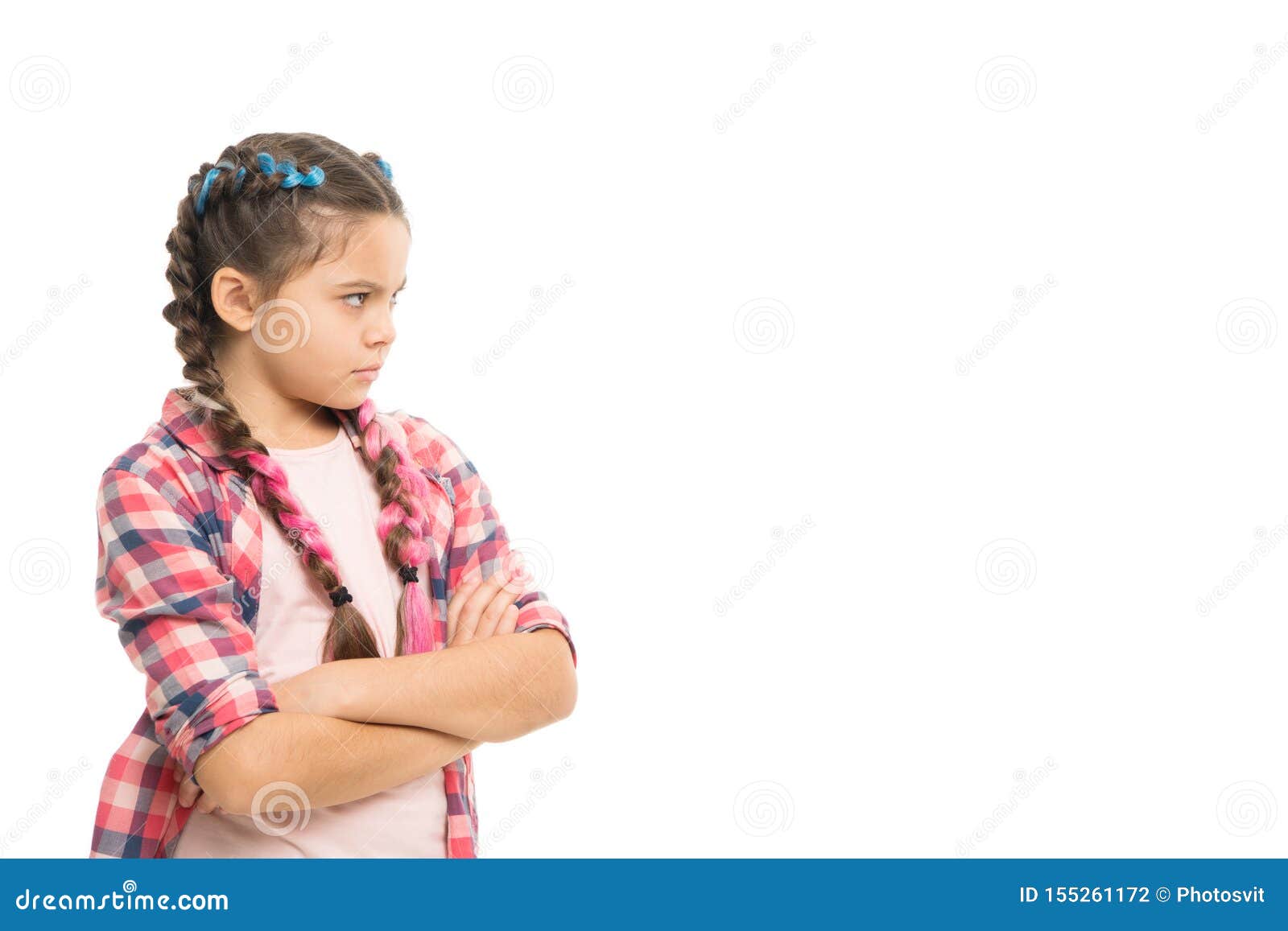 stubborn child. disagreement and stubbornness. girl serious face offended. kid looks strictly. girl folded arms on chest